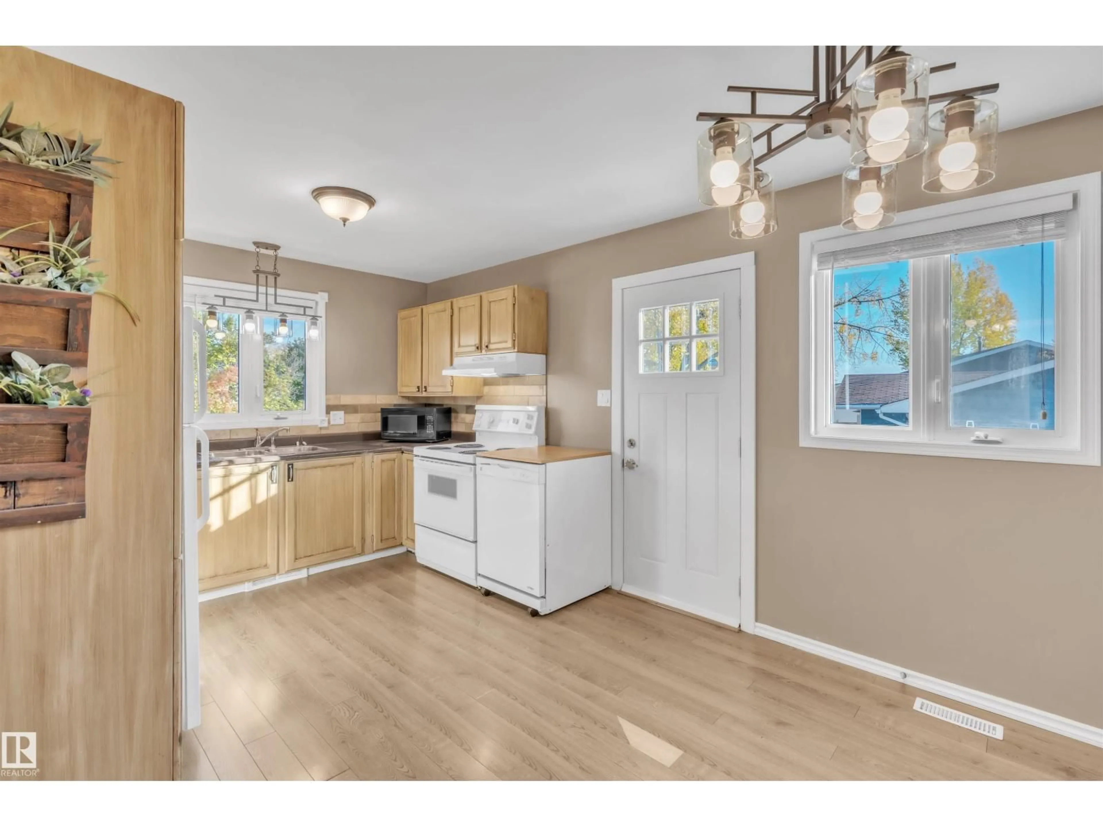 Open concept kitchen, wood/laminate floor for 1818 FOREST DR, Cold Lake Alberta T9M1L9