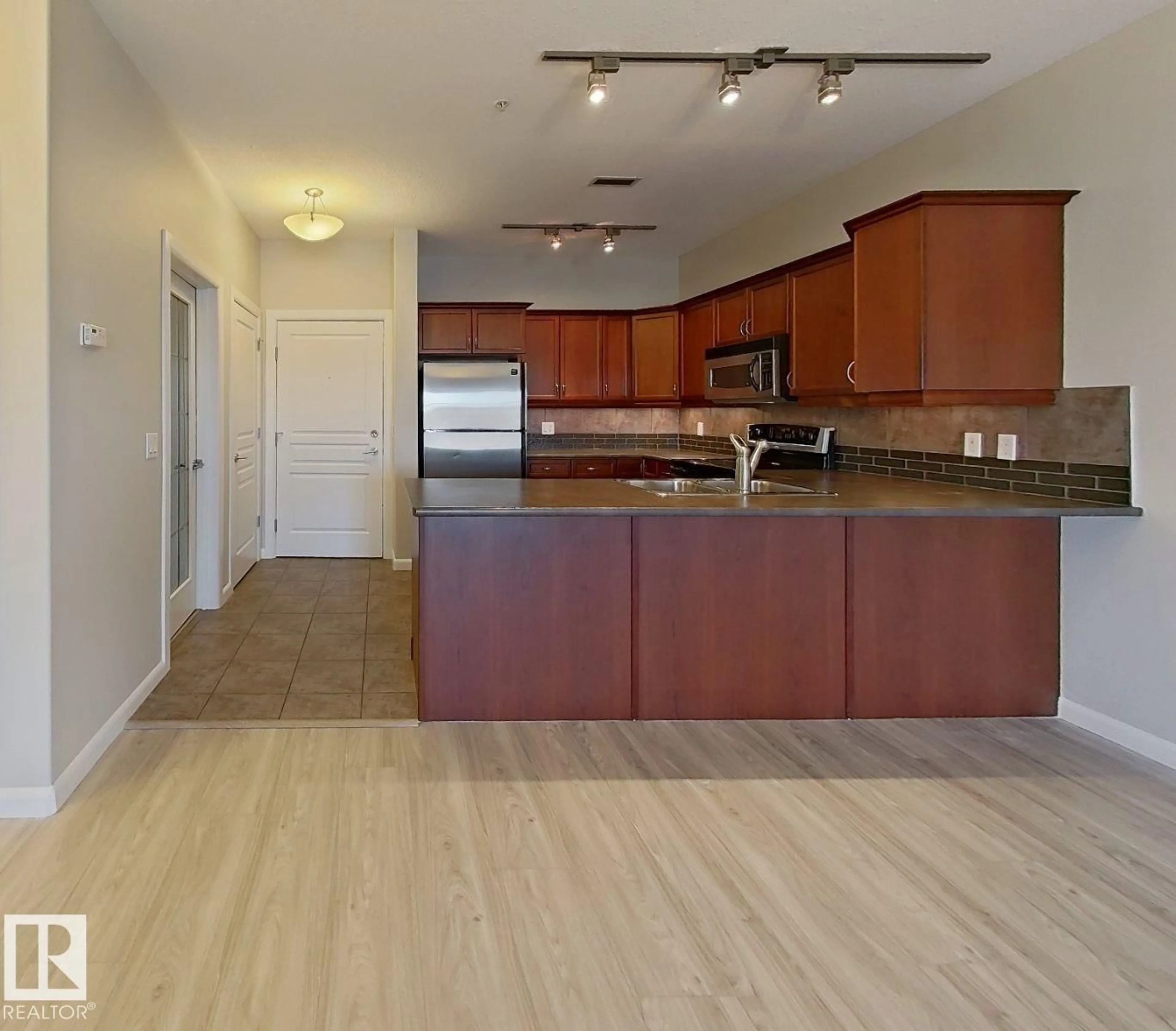 Open concept kitchen, unknown for 160 - 318 MAGRATH RD, Edmonton Alberta T6R3T7