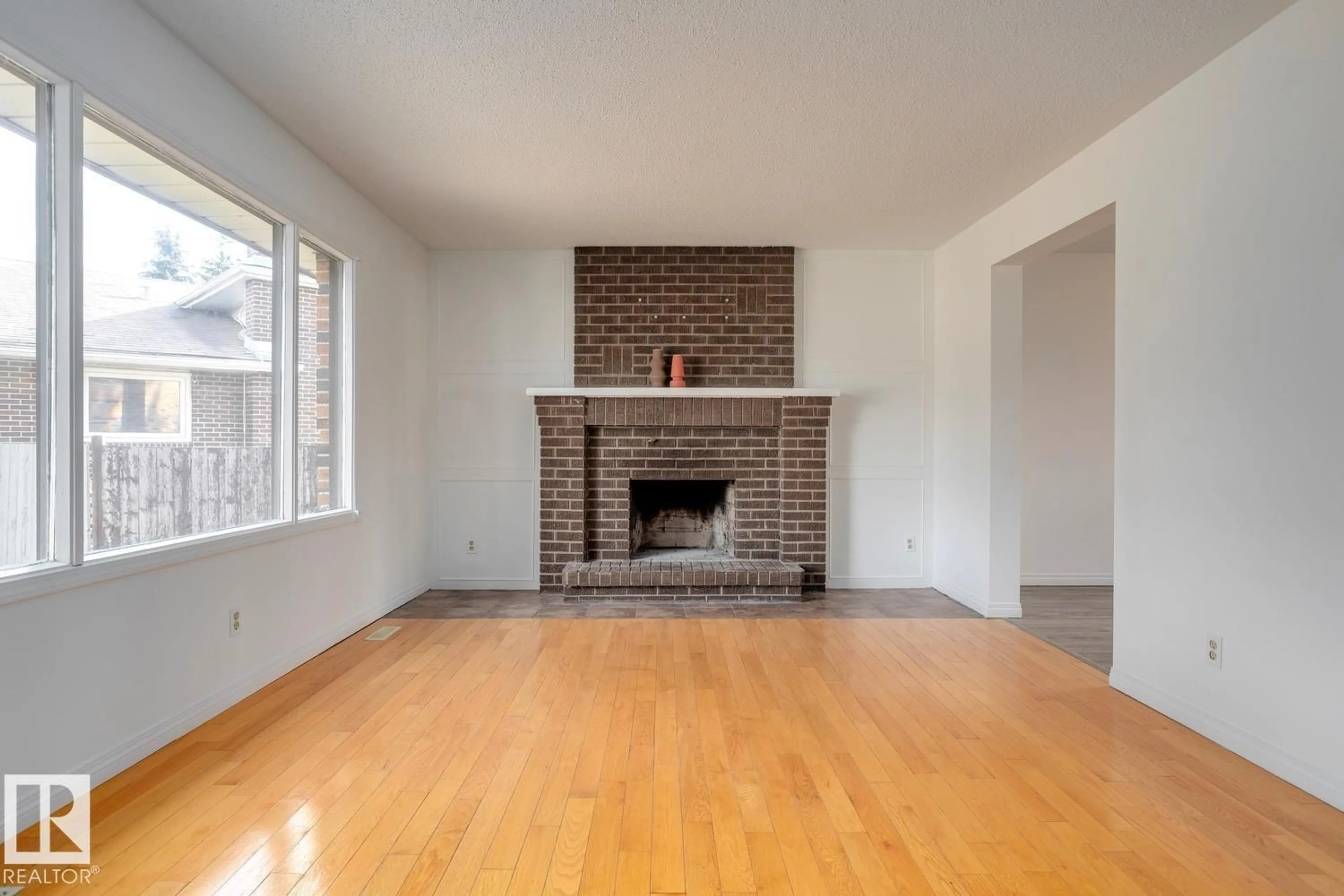 Living room with furniture, wood/laminate floor for 46 UMBACH RD, Stony Plain Alberta T7Z1G1