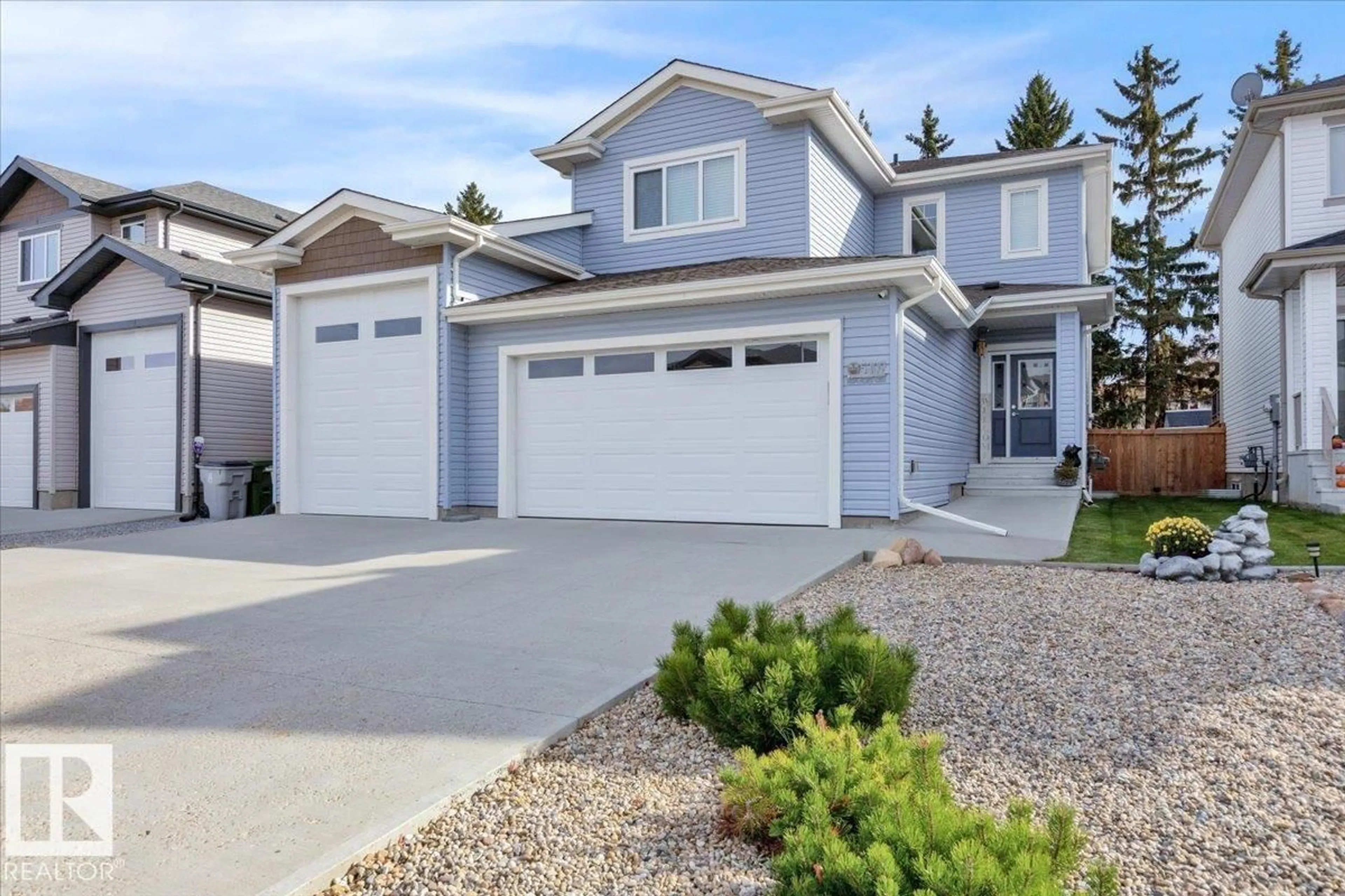 Home with vinyl exterior material, street for 5309 BON ACRES CR, Bon Accord Alberta T0A0K0