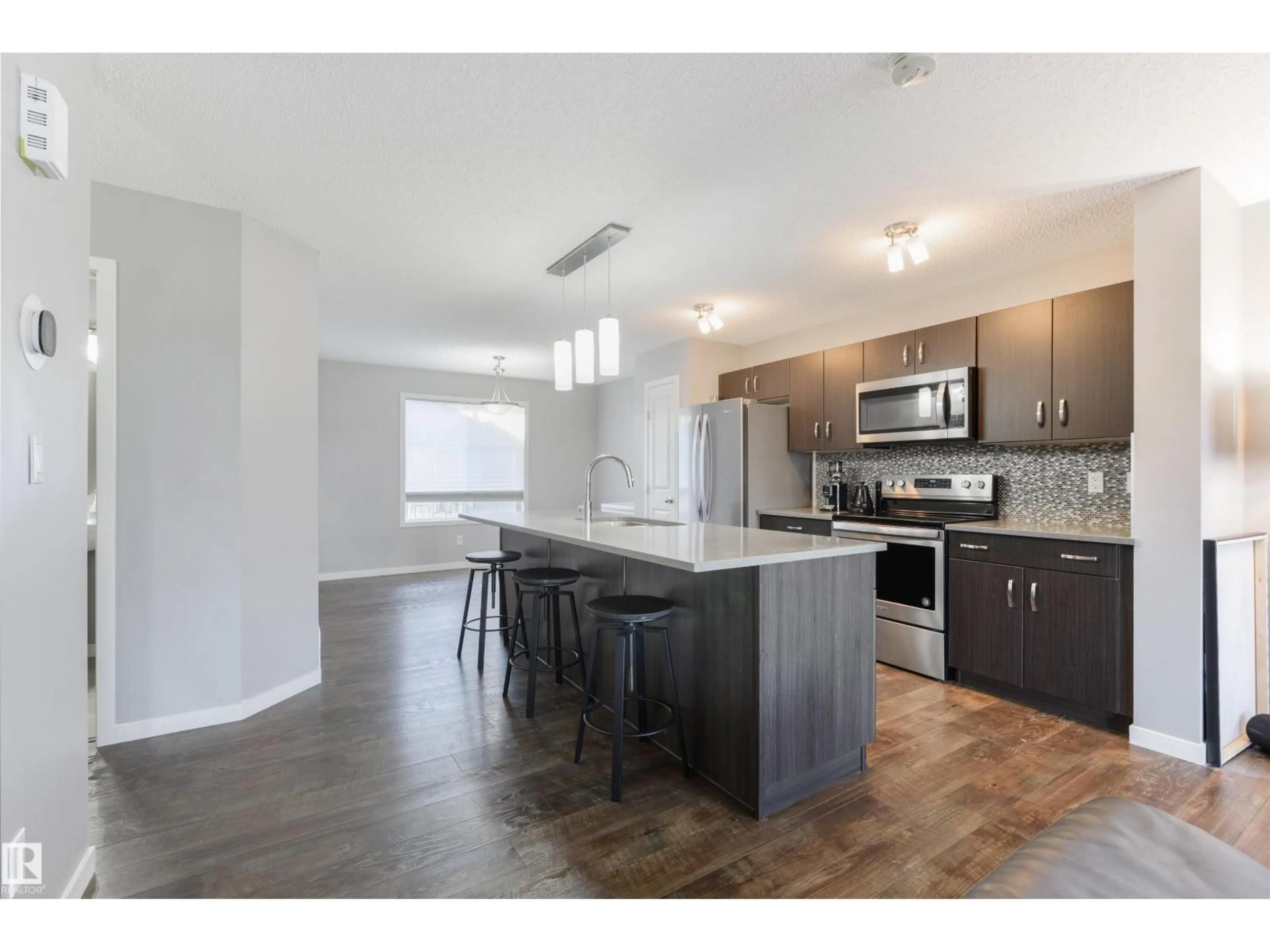 Open concept kitchen, unknown for #132 - 3305 ORCHARDS LINK LI, Edmonton Alberta T6X2H1