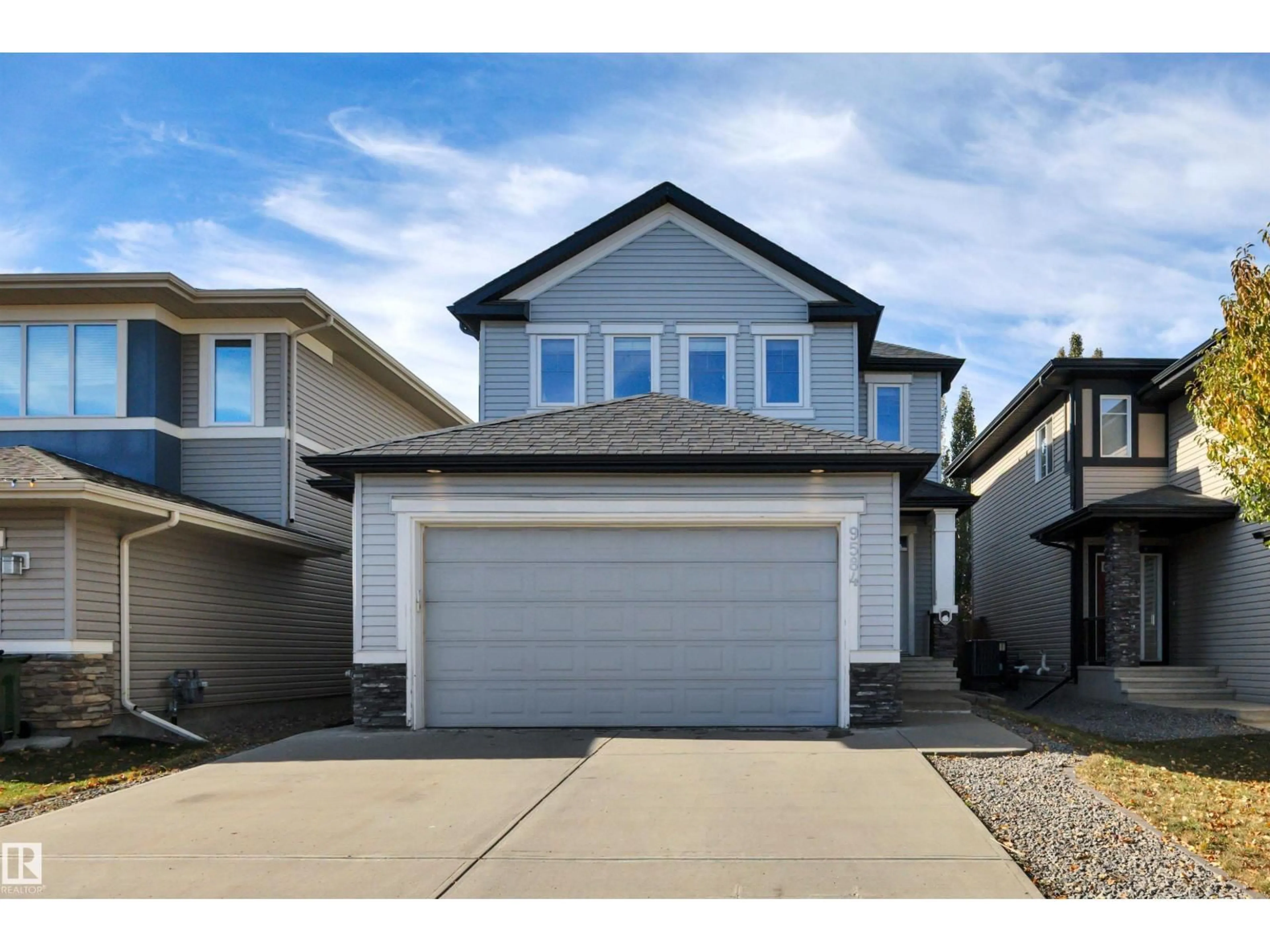 Home with vinyl exterior material, street for NW - 9584 221 ST, Edmonton Alberta T5T4A8