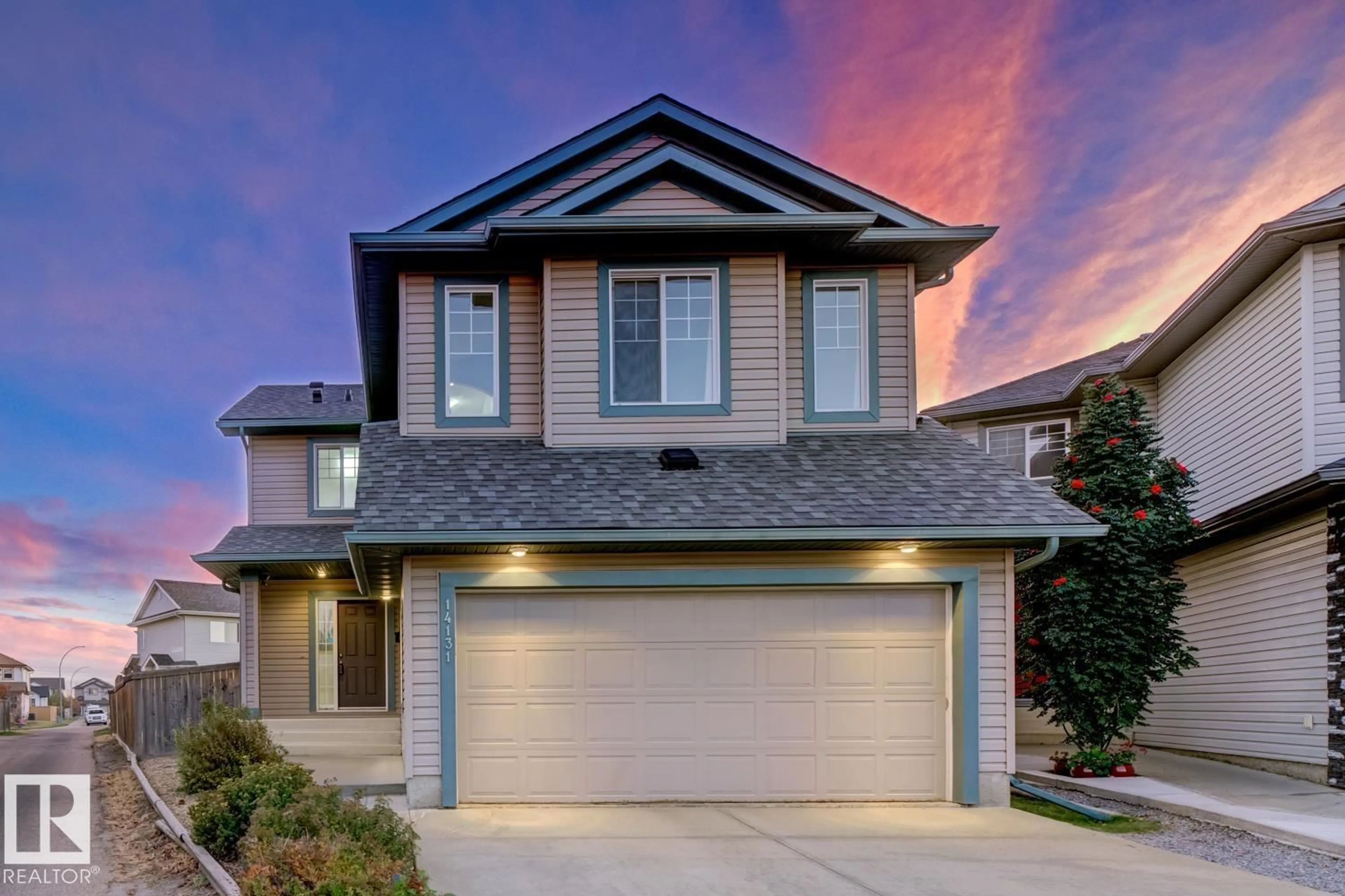 Home with vinyl exterior material, street for 14131 147 AV, Edmonton Alberta T6V0A8