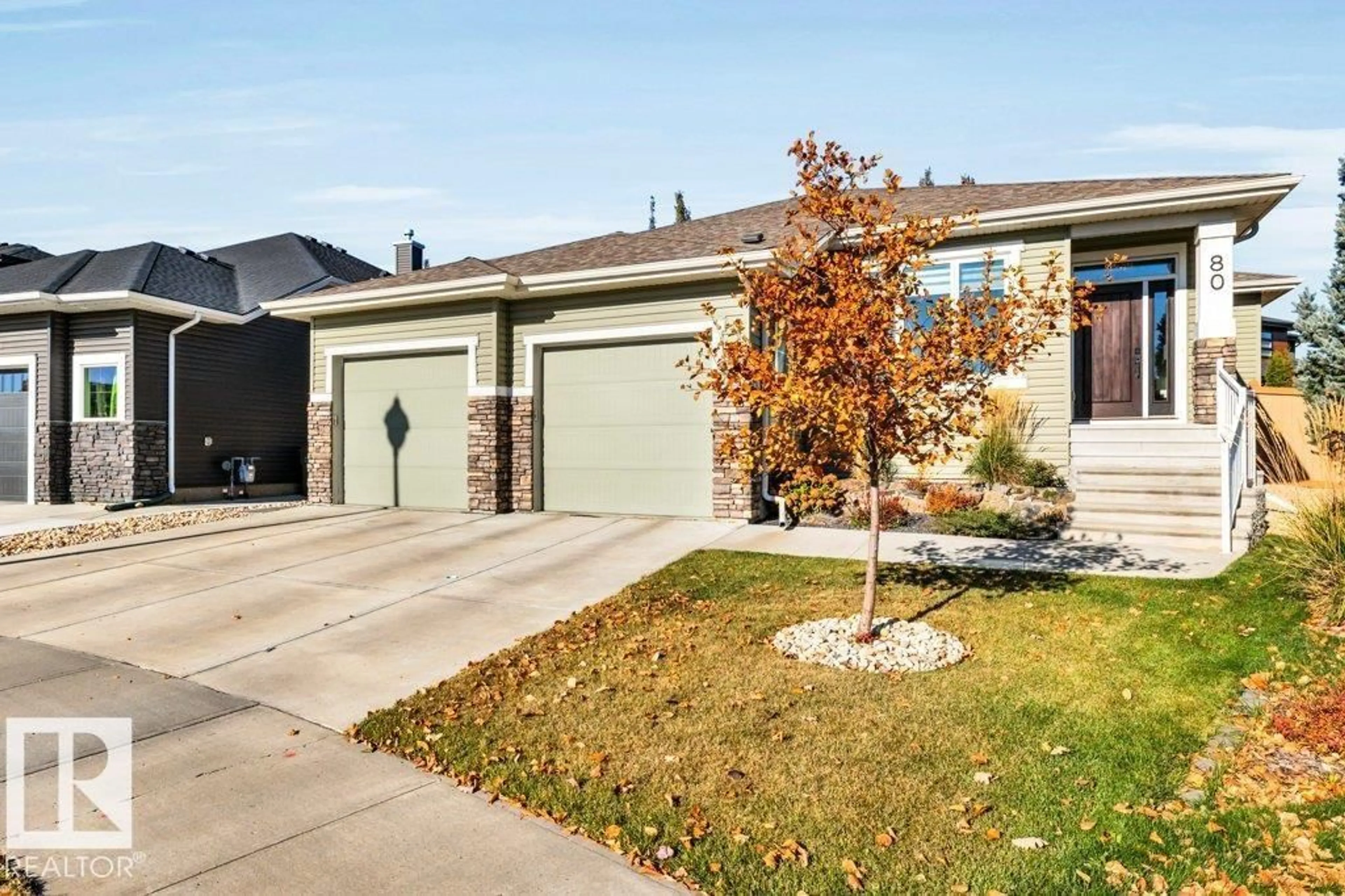 Home with vinyl exterior material, street for 80 WESTLIN DR, Leduc Alberta T9E0N7