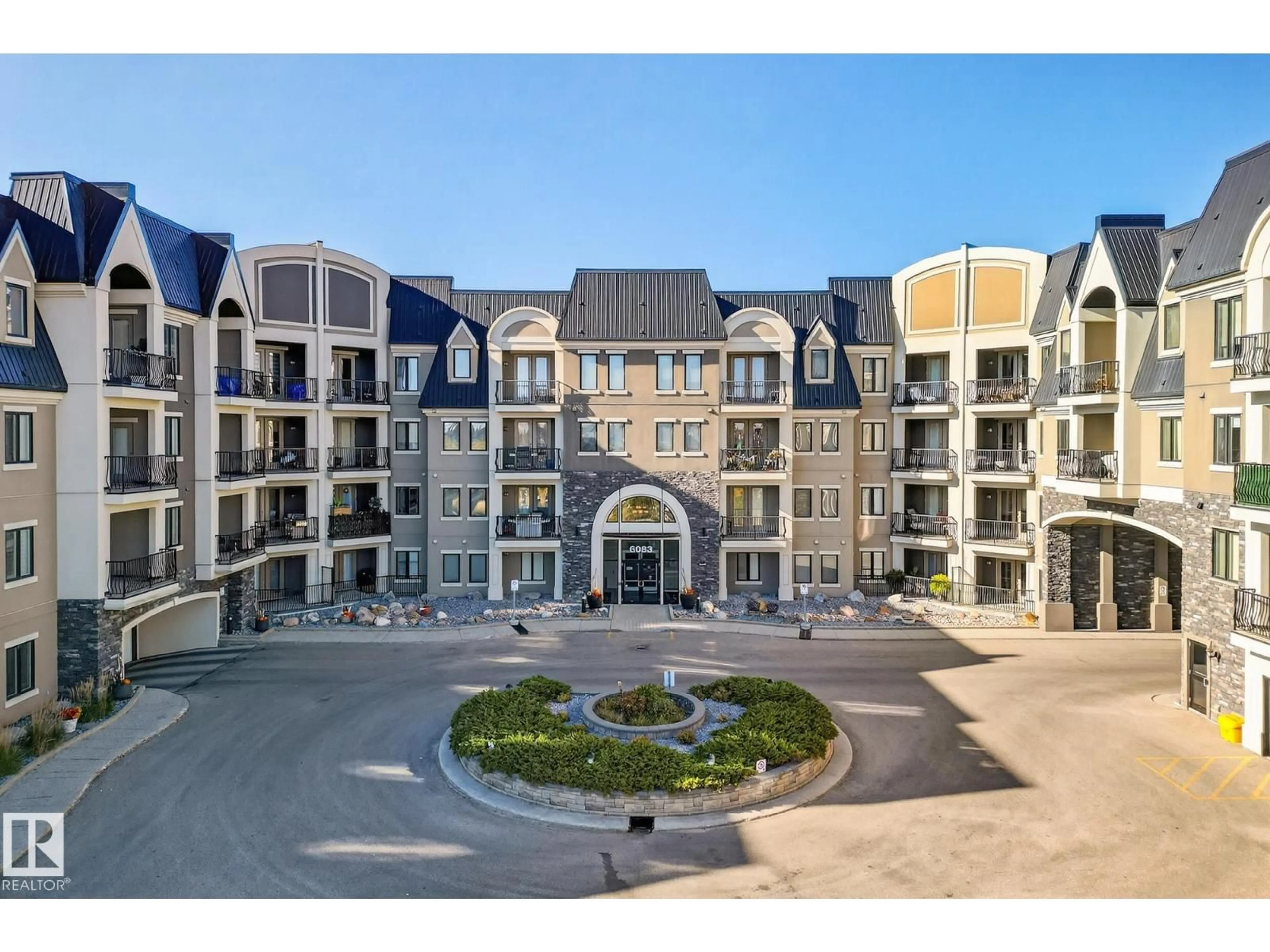 A pic from outside/outdoor area/front of a property/back of a property/a pic from drone, building for 6083 - 418 MAYNARD WY, Edmonton Alberta T6R0R5