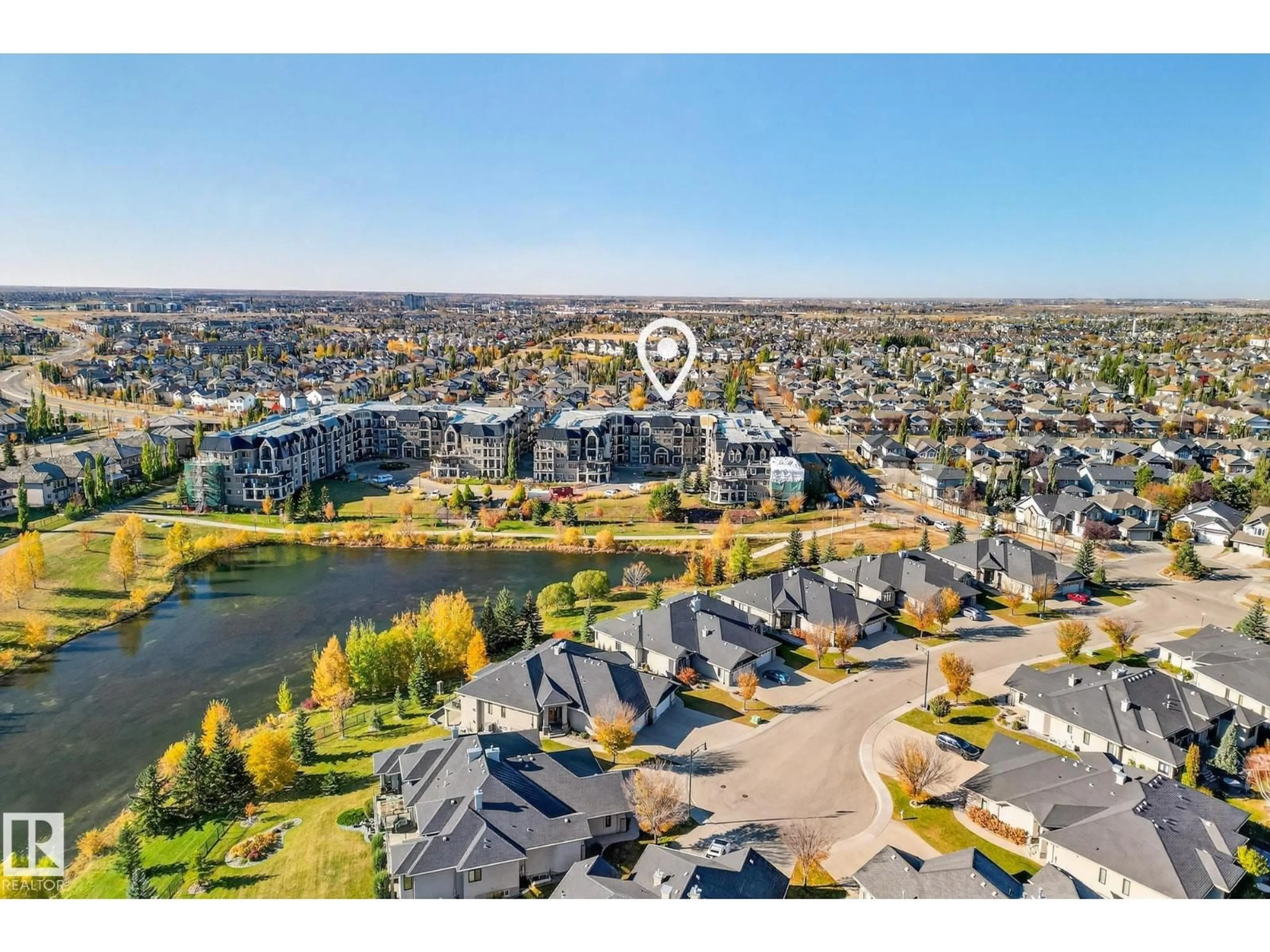 A pic from outside/outdoor area/front of a property/back of a property/a pic from drone, water/lake/river/ocean view for 6083 - 418 MAYNARD WY, Edmonton Alberta T6R0R5