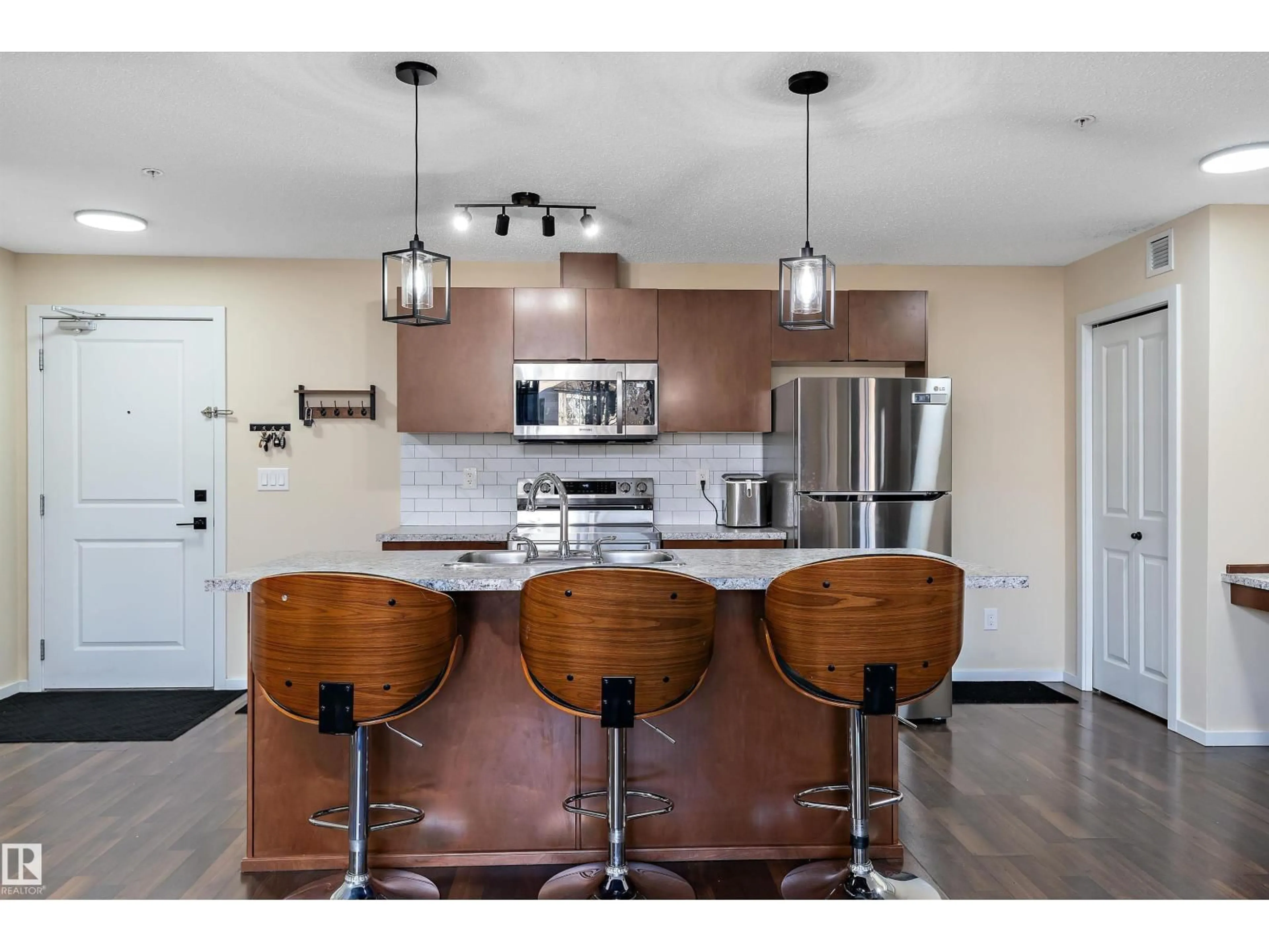 Open concept kitchen, unknown for #122 - 3357 16A AV, Edmonton Alberta T5T1W1