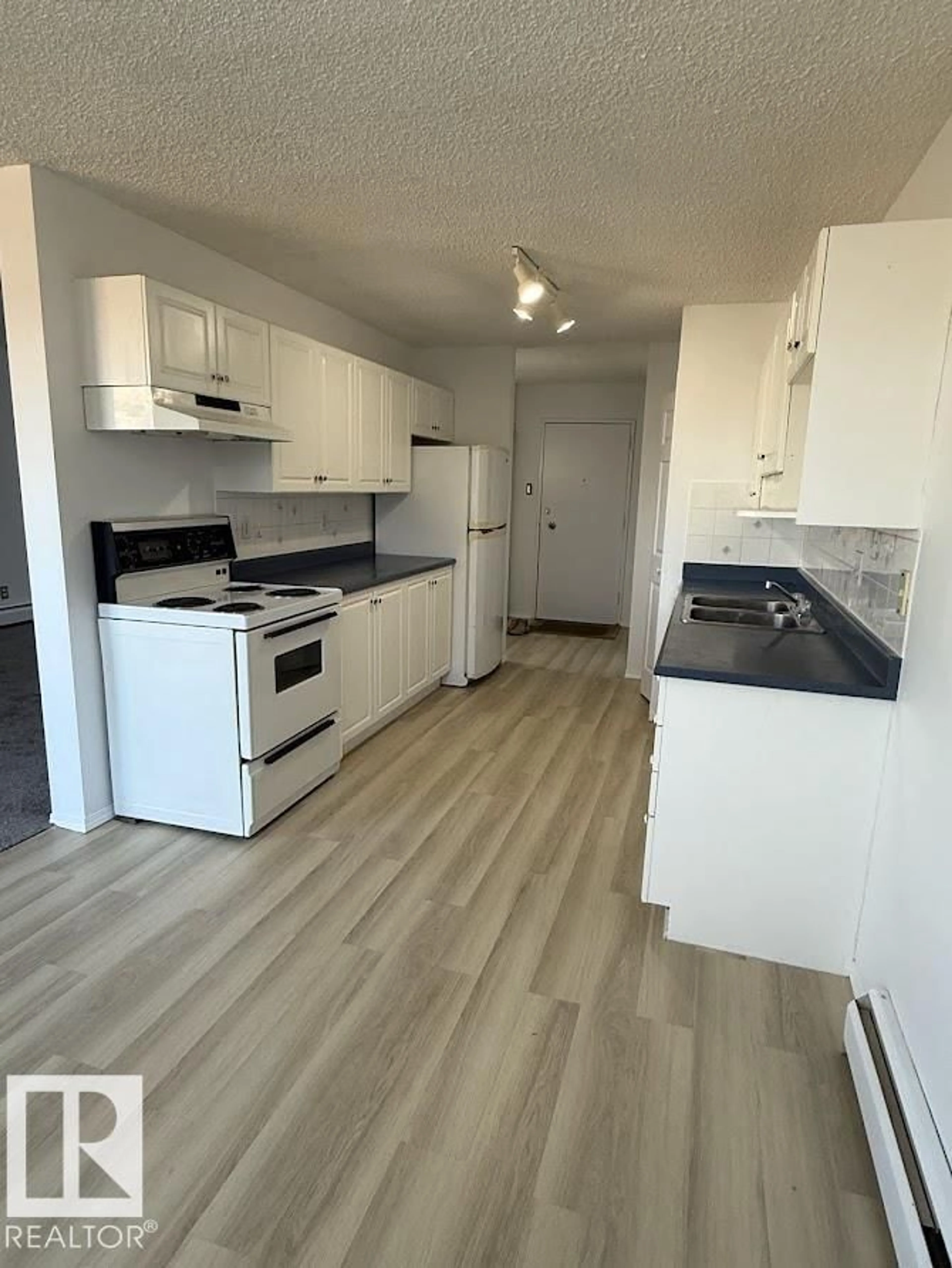 Standard kitchen, wood/laminate floor for 216 - 7835 159 ST, Edmonton Alberta T5R2E1