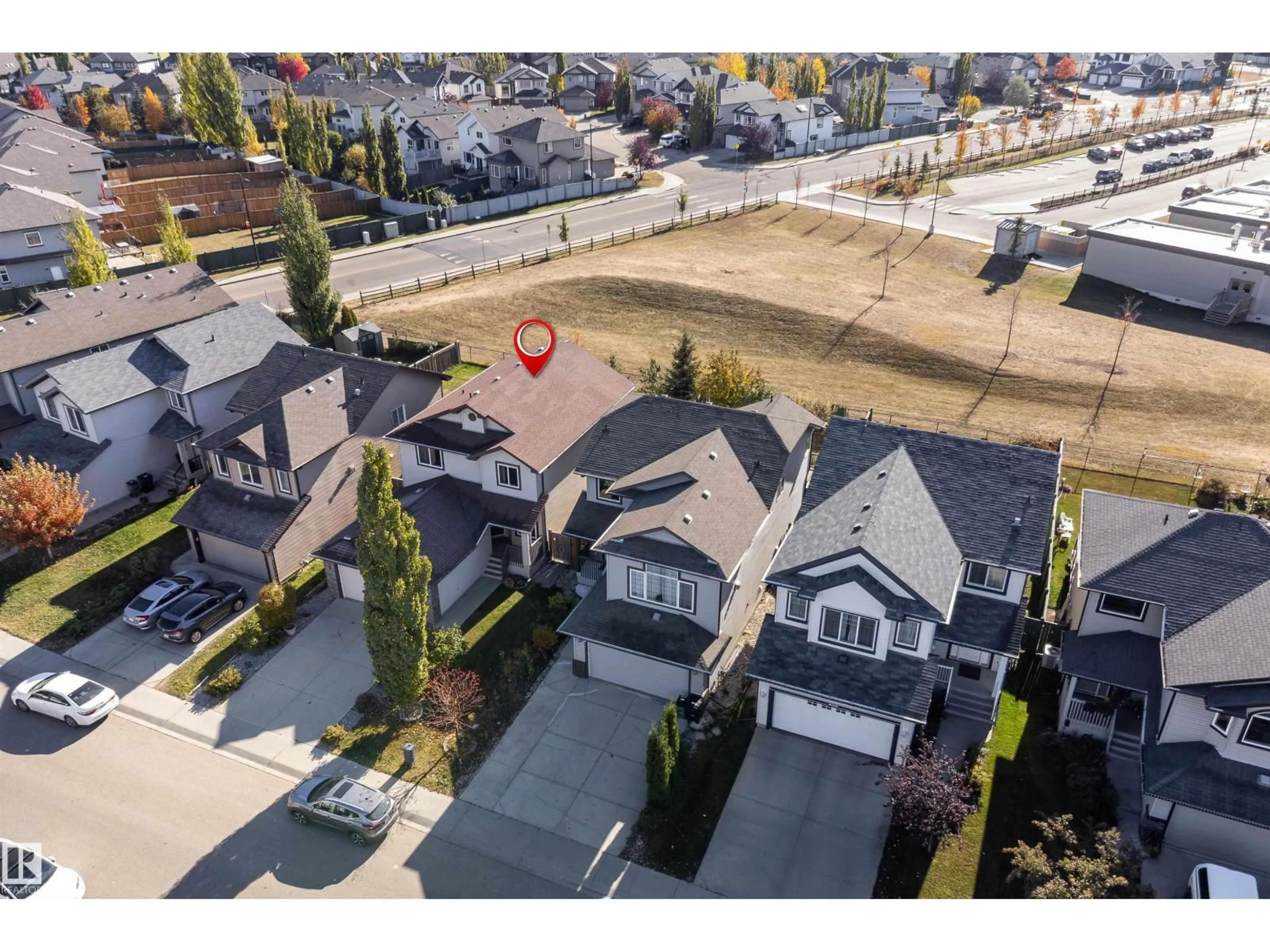 A pic from outside/outdoor area/front of a property/back of a property/a pic from drone, street for 20715 94 AV, Edmonton Alberta T5T4B8