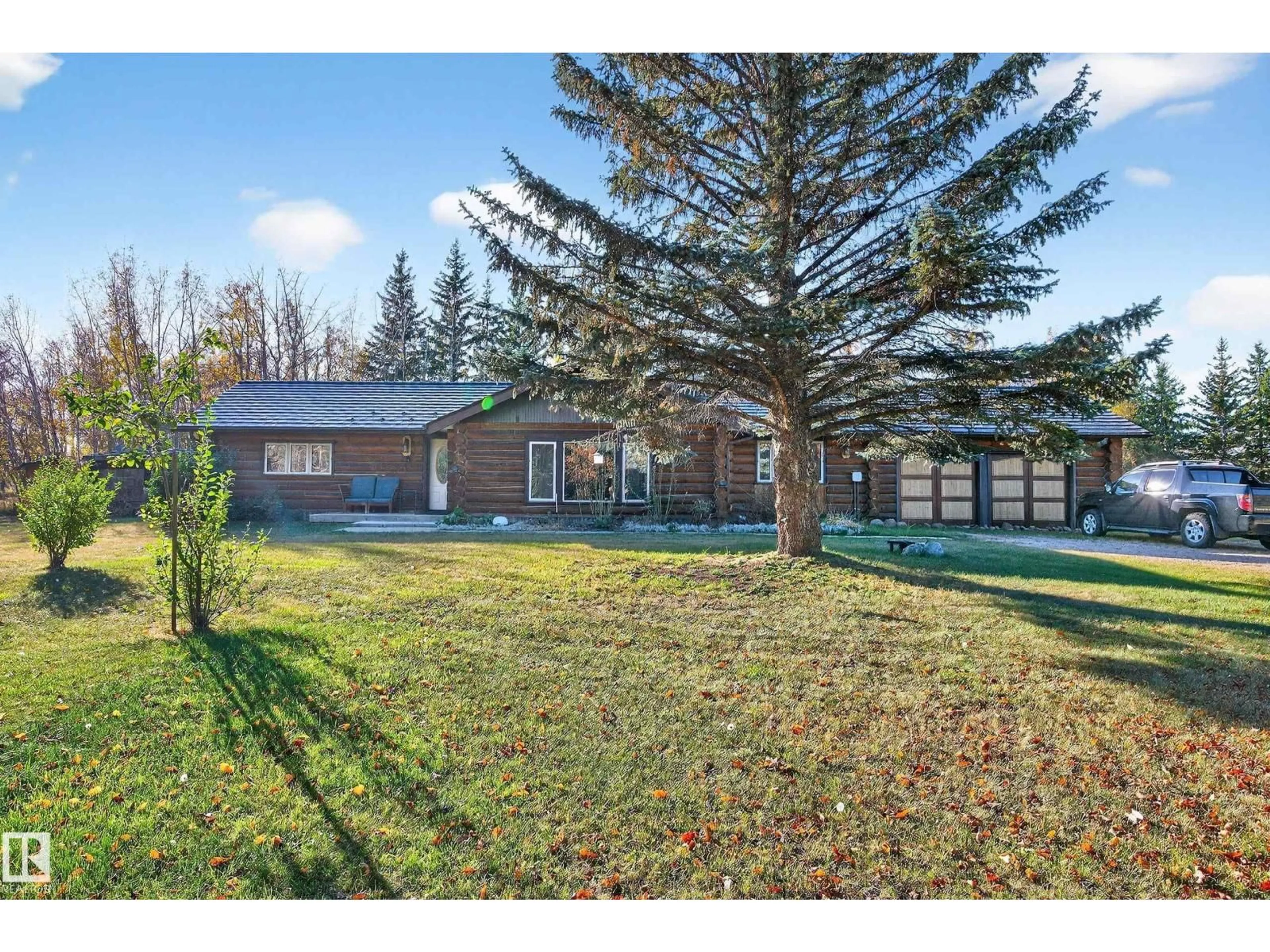 A pic from outside/outdoor area/front of a property/back of a property/a pic from drone, street for 51317 - 4 HGHWAY 60, Rural Parkland County Alberta T7Y1C4