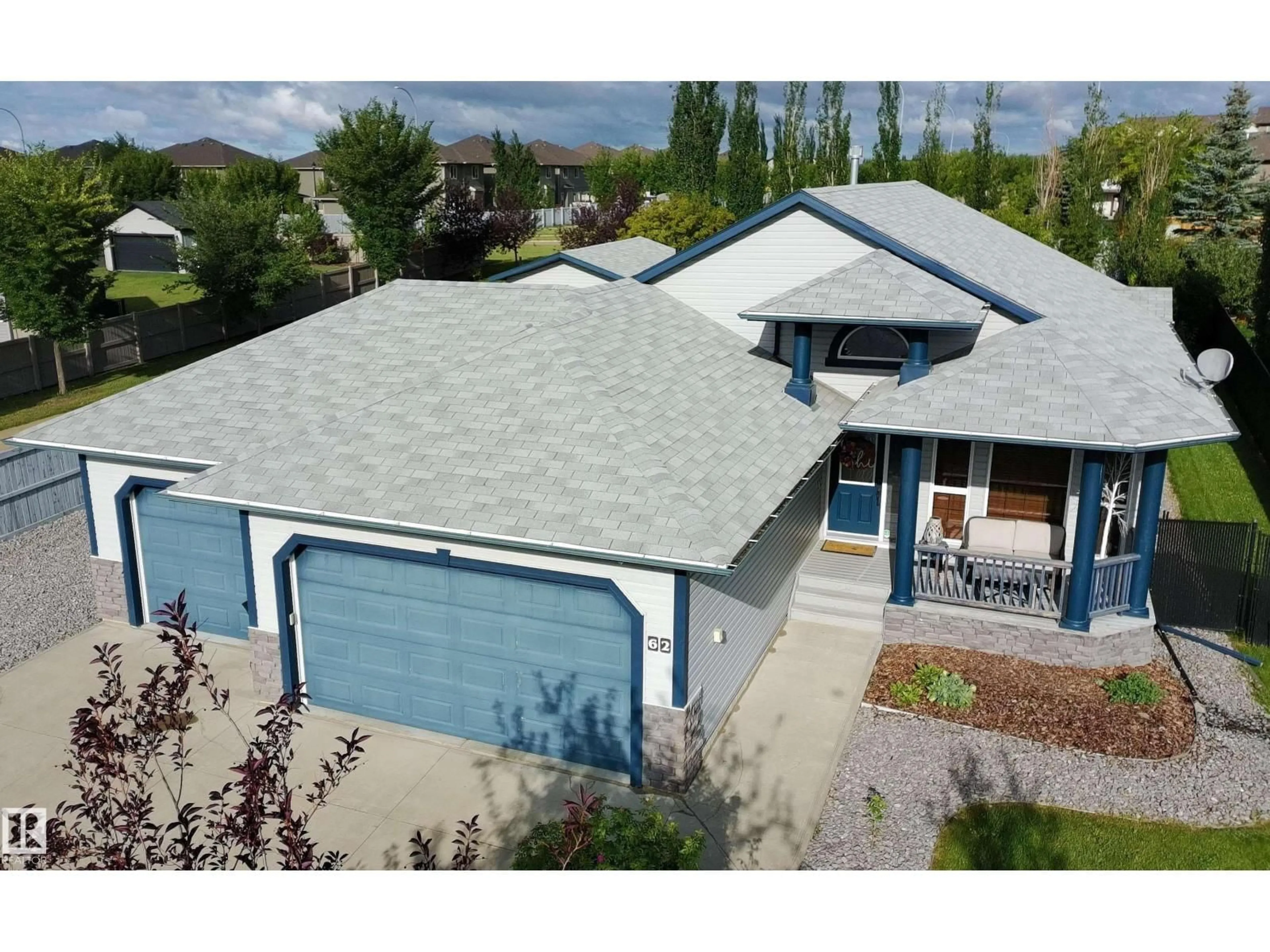Home with vinyl exterior material, street for 62 GREENFIELD WD, Fort Saskatchewan Alberta T8L0E3