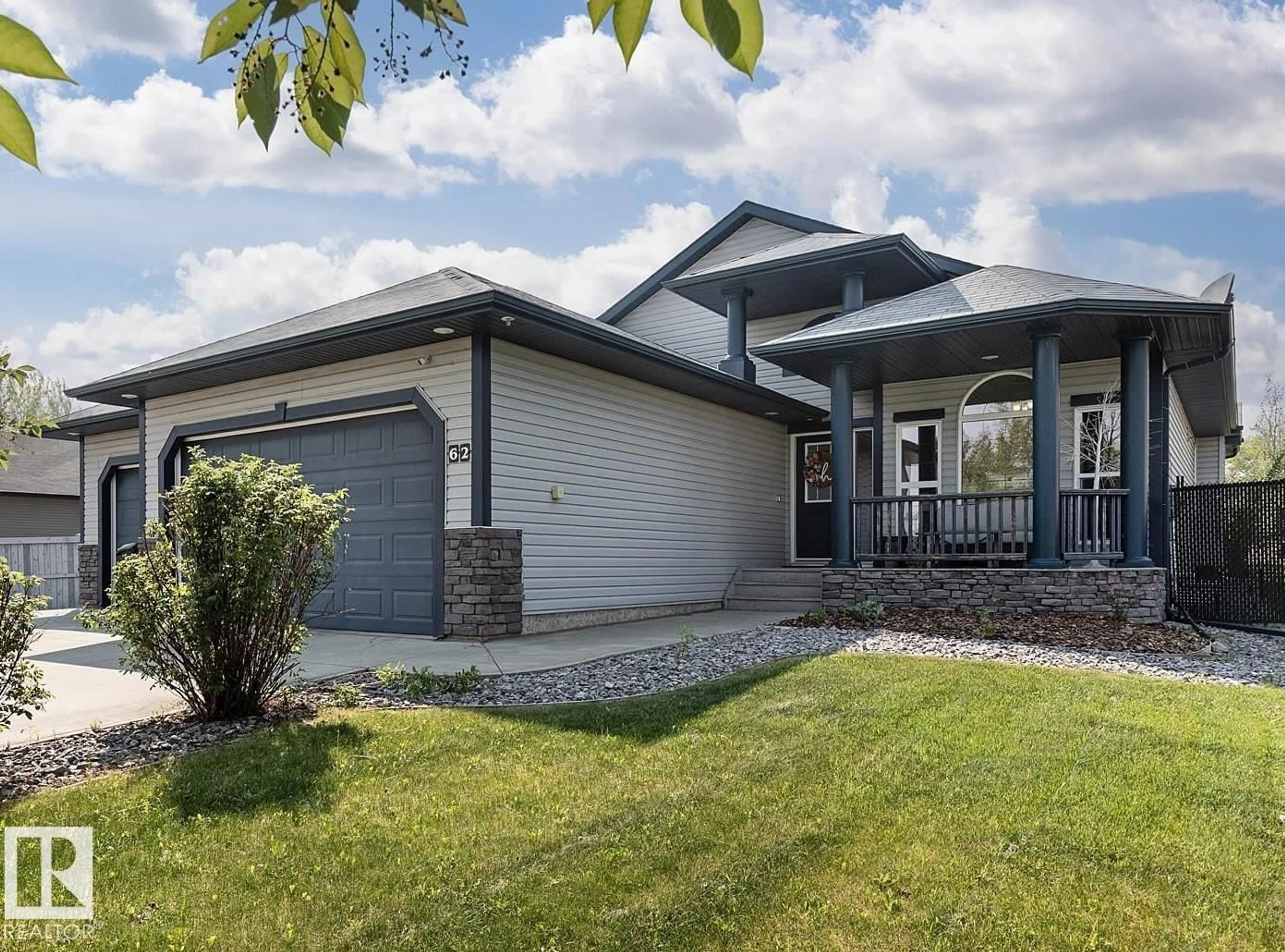 Home with vinyl exterior material, street for 62 GREENFIELD WD, Fort Saskatchewan Alberta T8L0E3