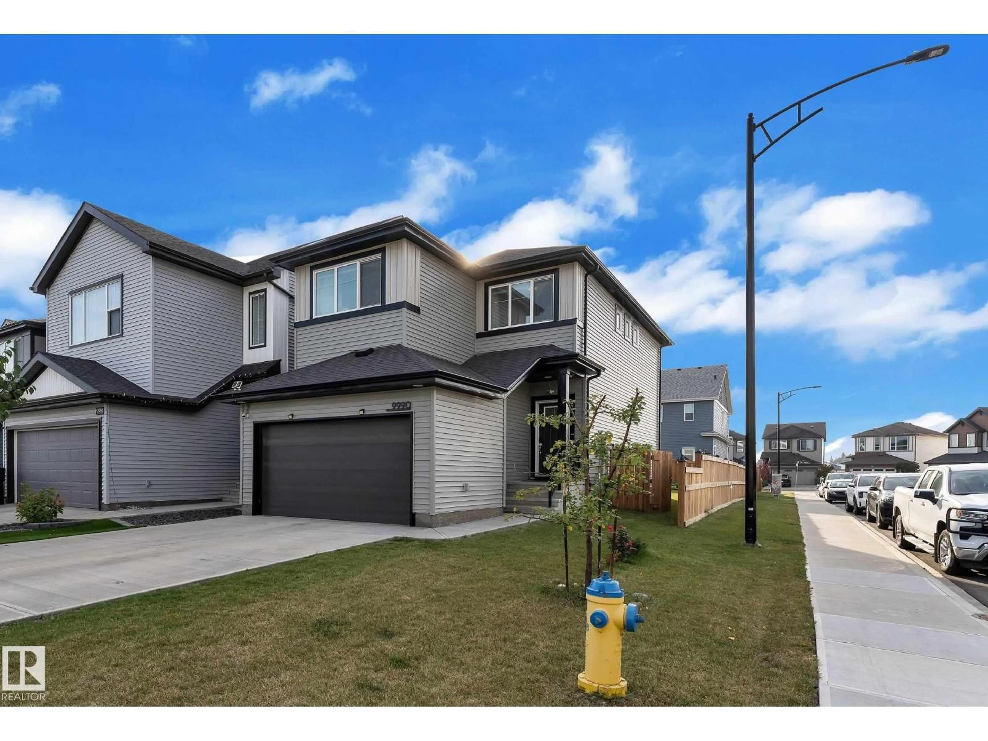 A pic from outside/outdoor area/front of a property/back of a property/a pic from drone, street for NW - 9990 205A ST, Edmonton Alberta T5T7N4