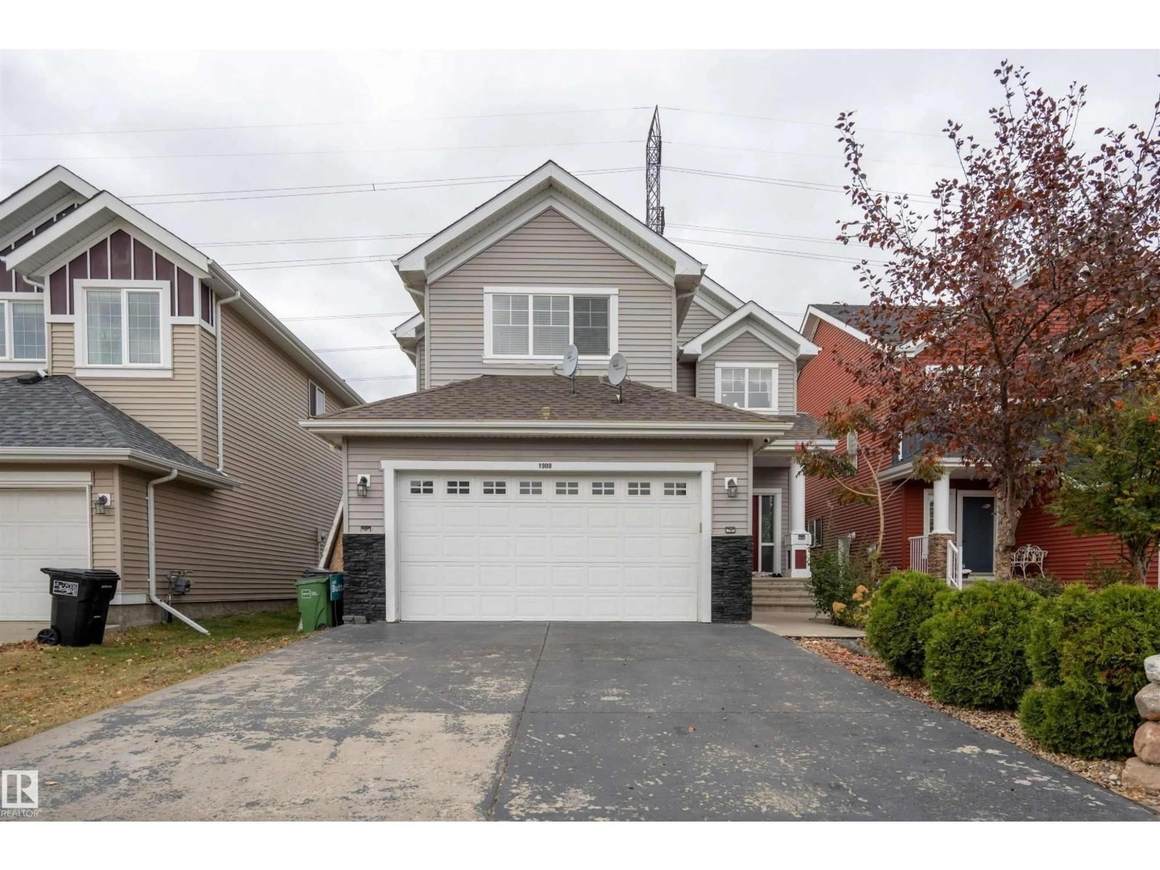 Home with vinyl exterior material, street for SW SW - 1908 86 ST, Edmonton Alberta T6X1A2