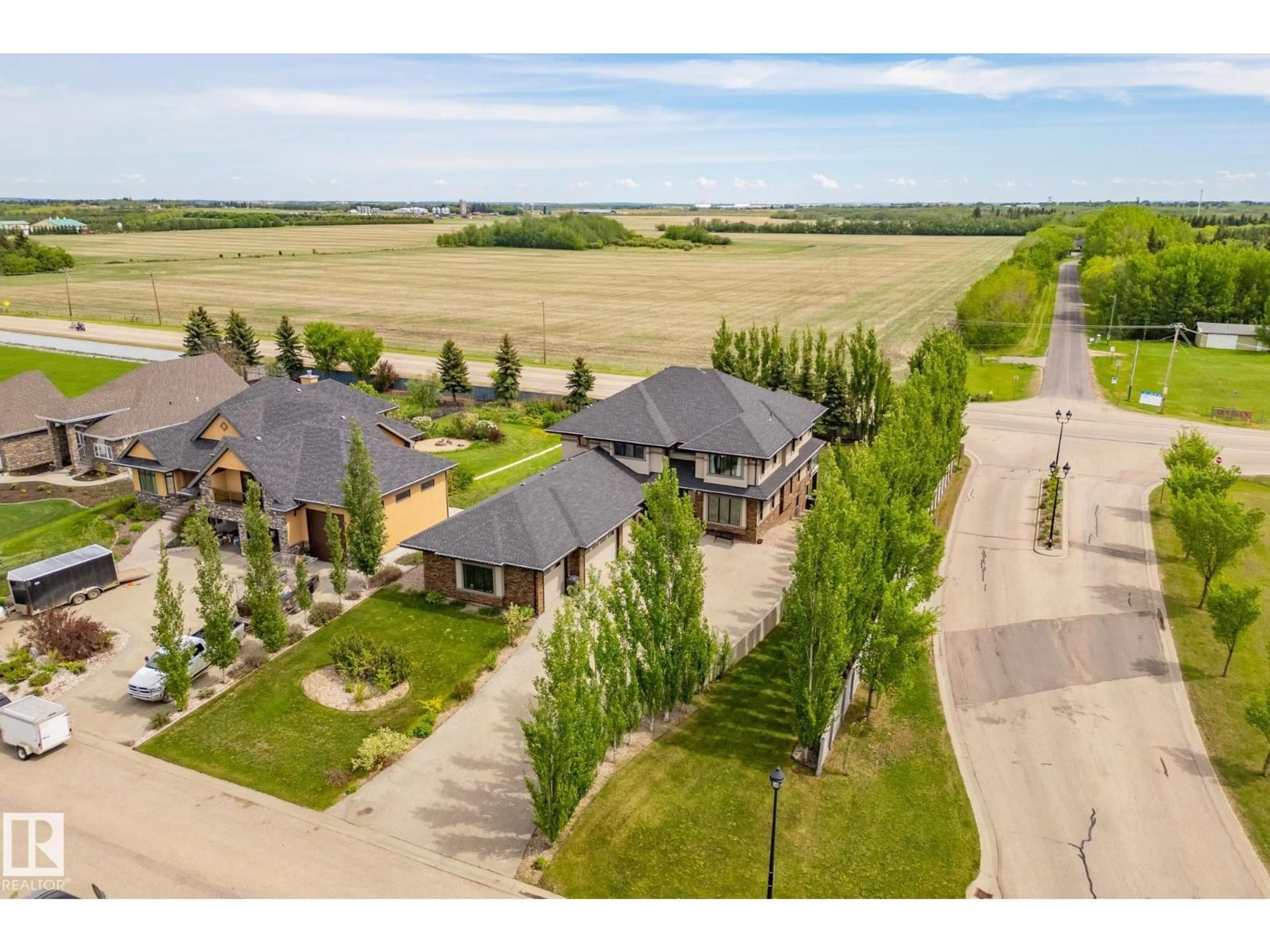 A pic from outside/outdoor area/front of a property/back of a property/a pic from drone, street for 54302 RGE ROAD 250, Rural Sturgeon County Alberta T8T0C9