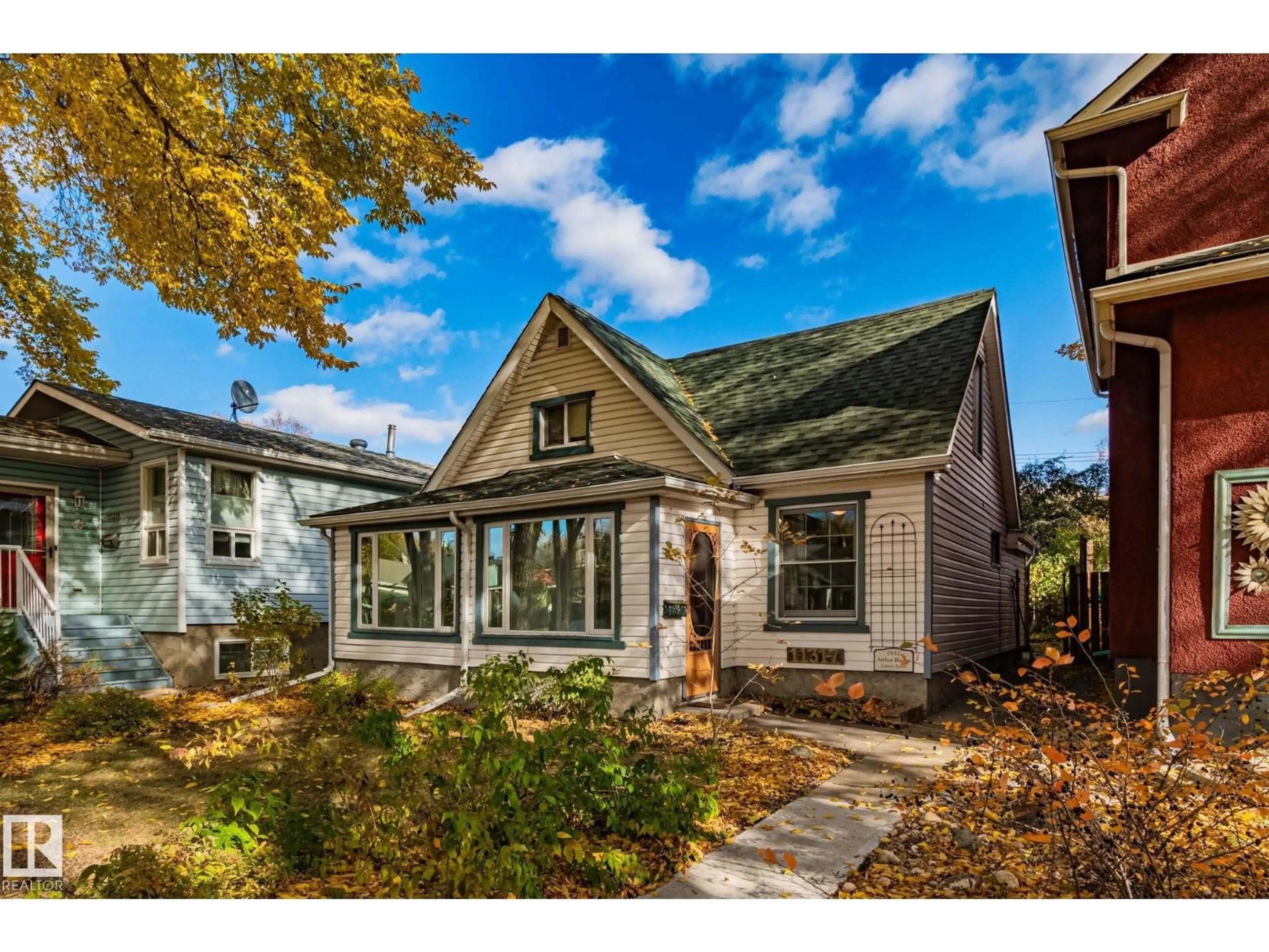 Home with brick exterior material, street for NW - 11317 66 ST, Edmonton Alberta T5B1H5