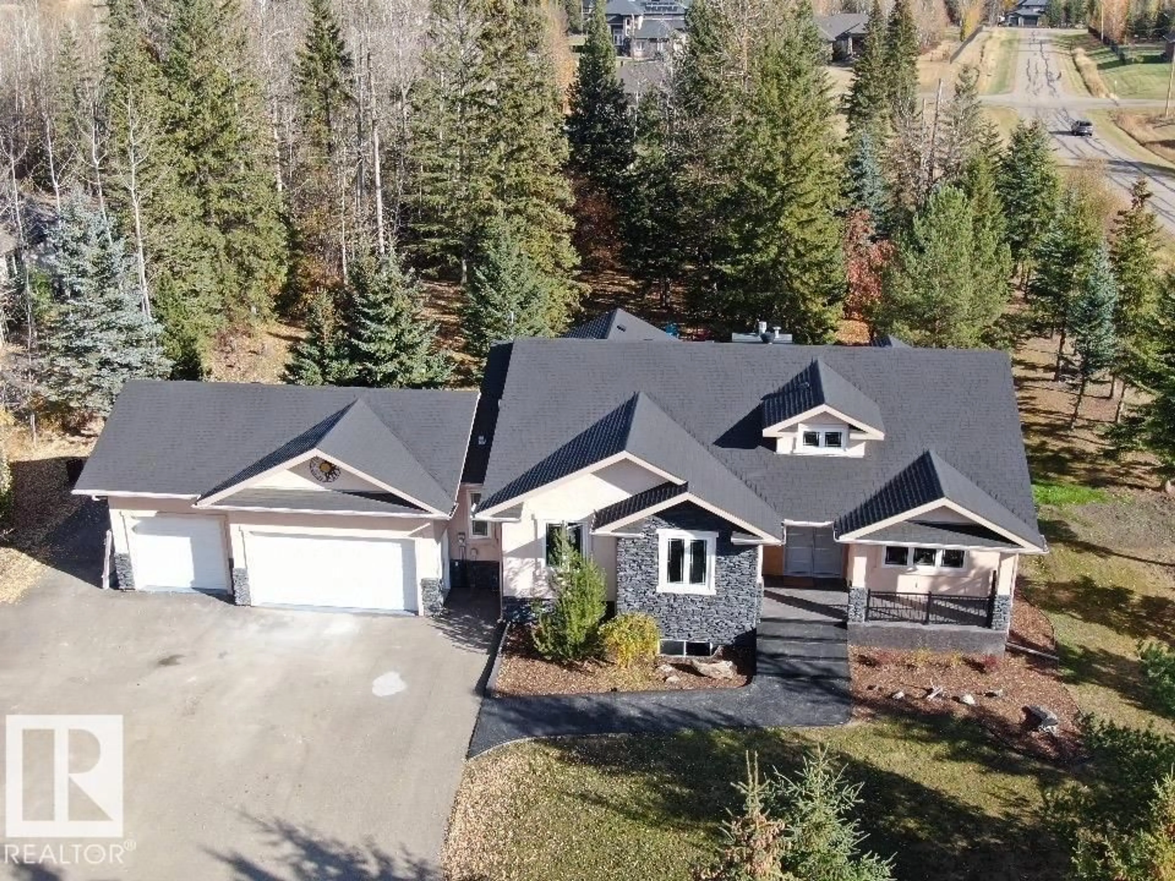 A pic from outside/outdoor area/front of a property/back of a property/a pic from drone, mountain view for 86 53305 RGE ROAD 273, Rural Parkland County Alberta T7X3N4