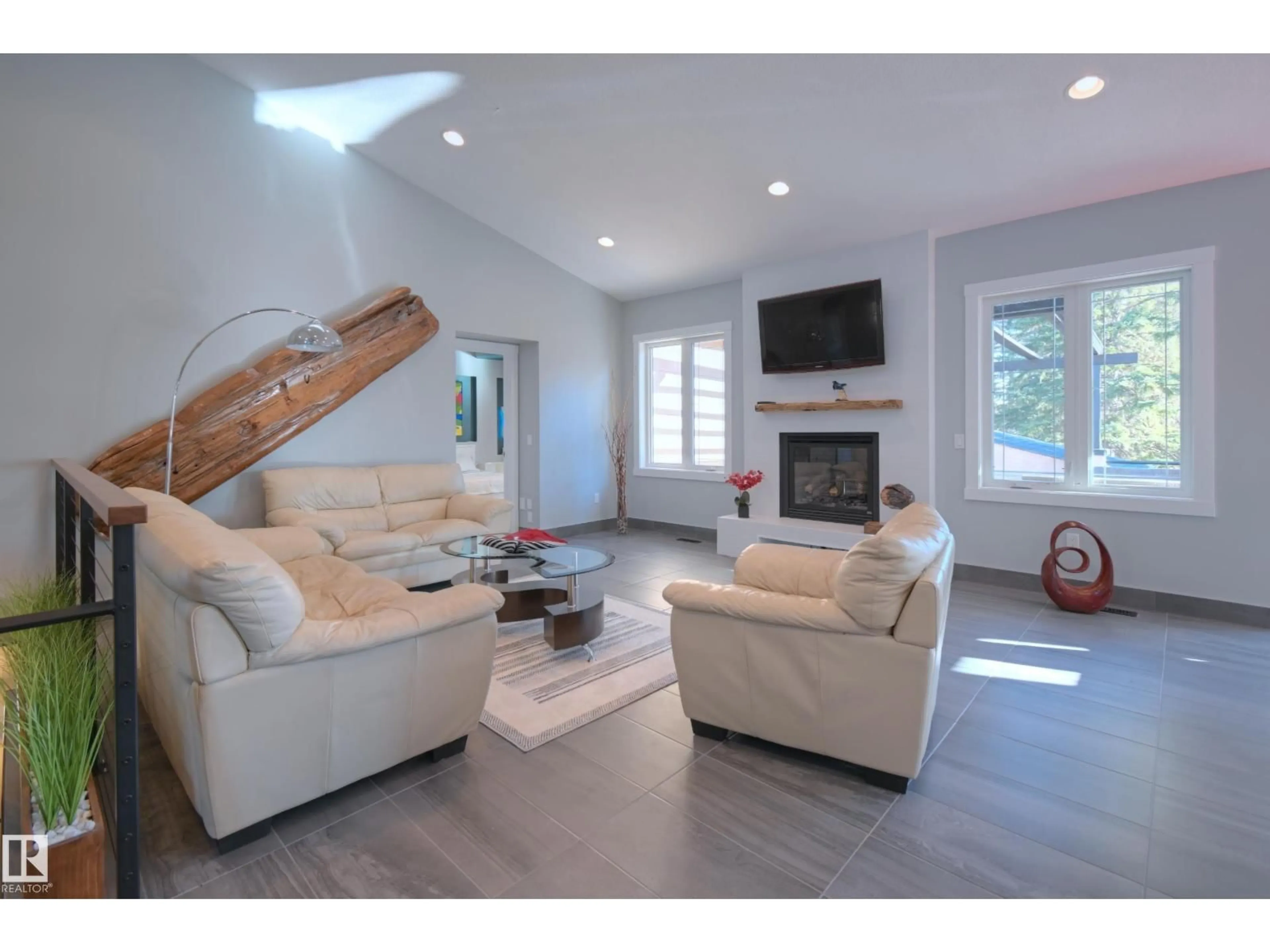 Living room with furniture, wood/laminate floor for 86 53305 RGE ROAD 273, Rural Parkland County Alberta T7X3N4