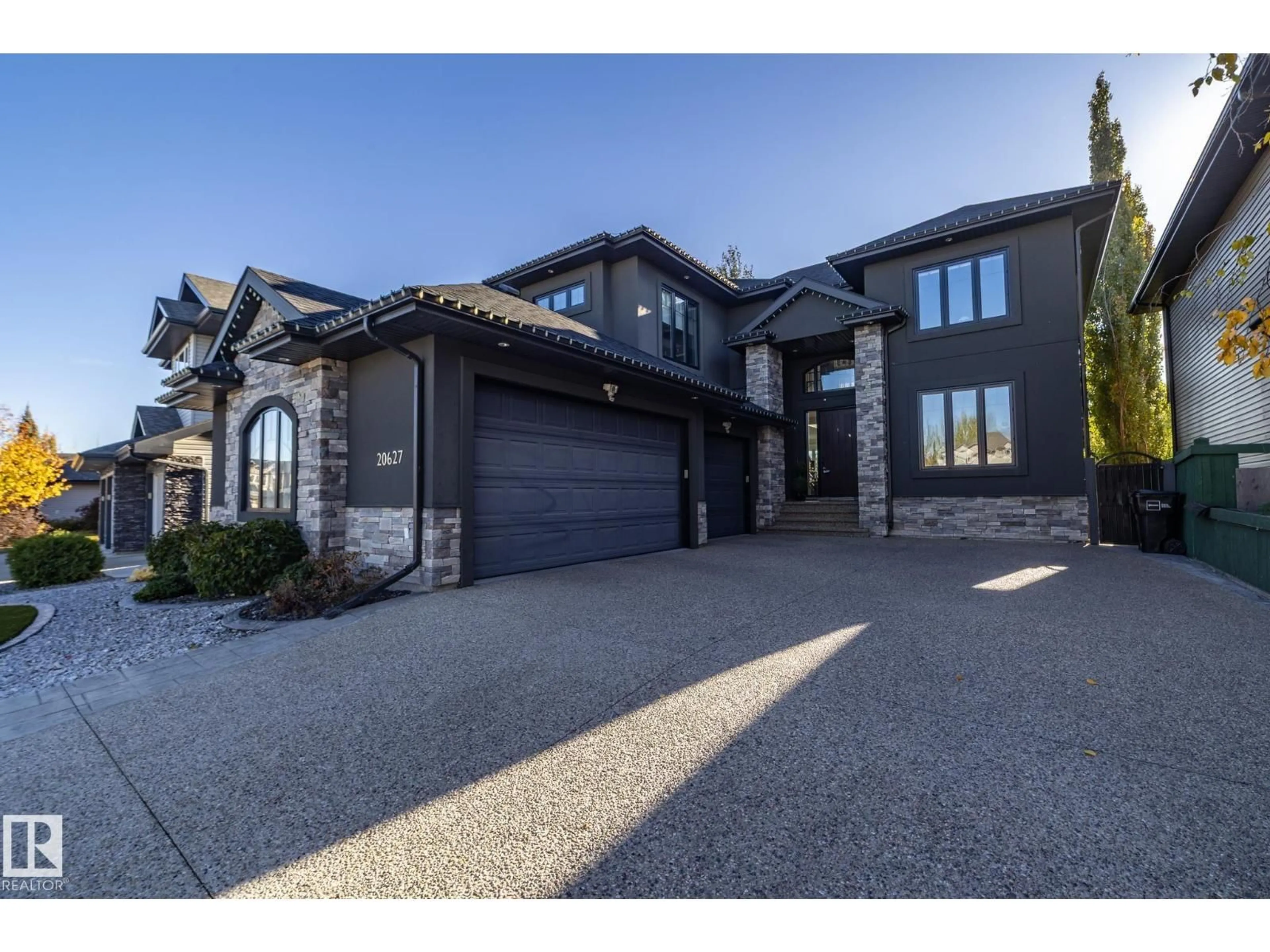 Home with brick exterior material, street for 20627 93 AV, Edmonton Alberta T5T4B2
