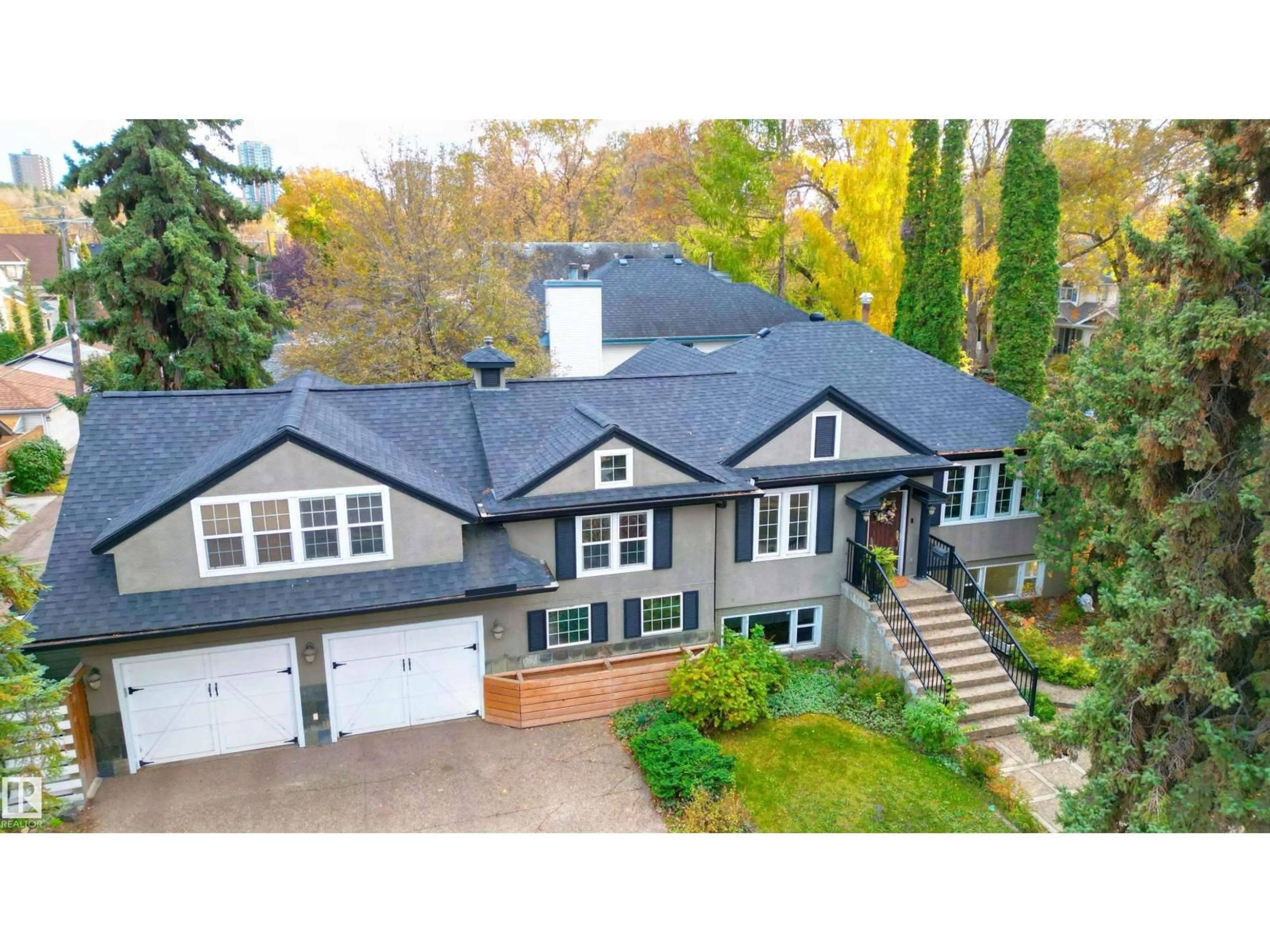 A pic from outside/outdoor area/front of a property/back of a property/a pic from drone, street for 10015 97 AV, Edmonton Alberta T5K0A9