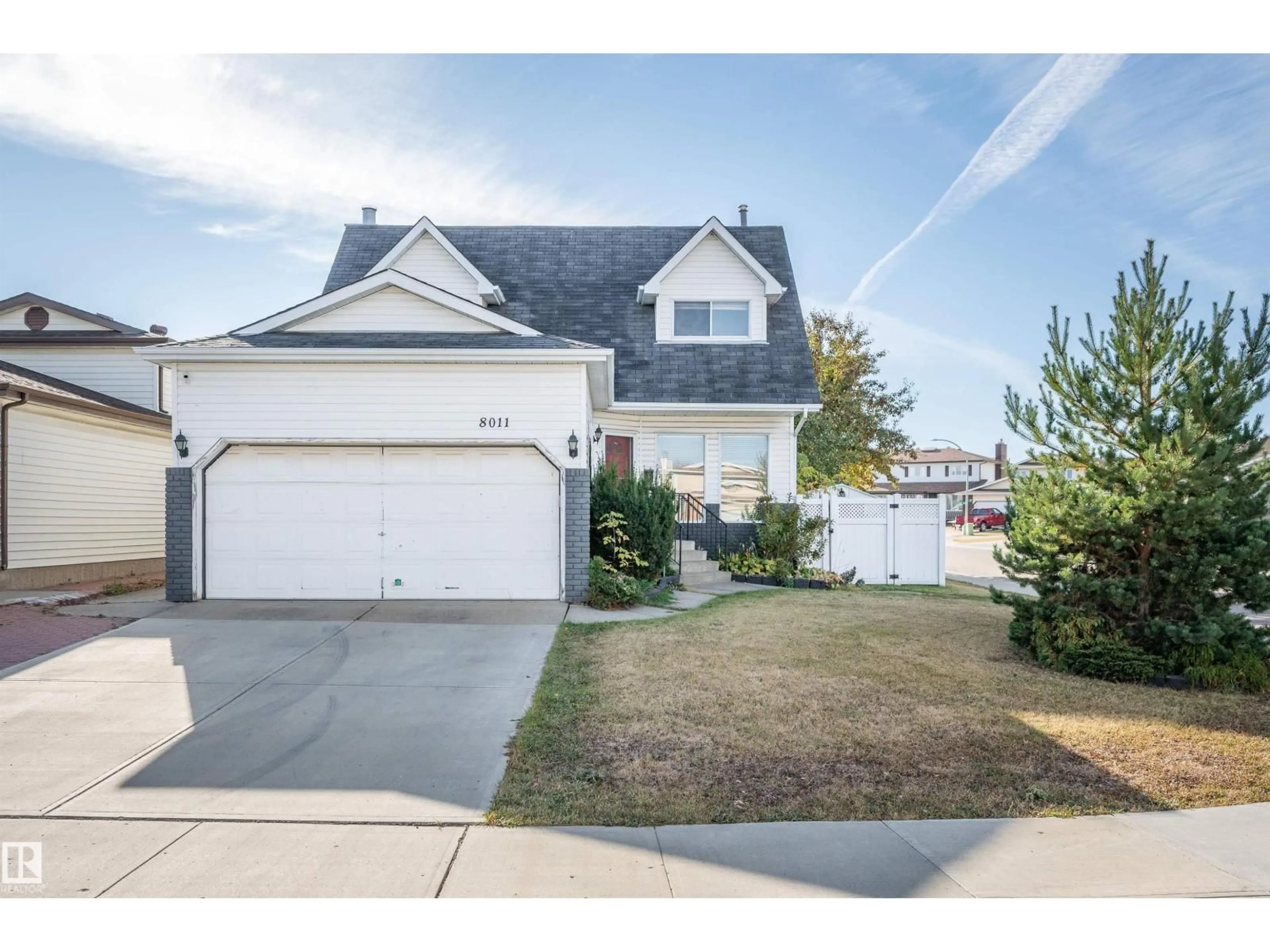 Home with vinyl exterior material, street for 8011 152C AV AV, Edmonton Alberta T6C3M1