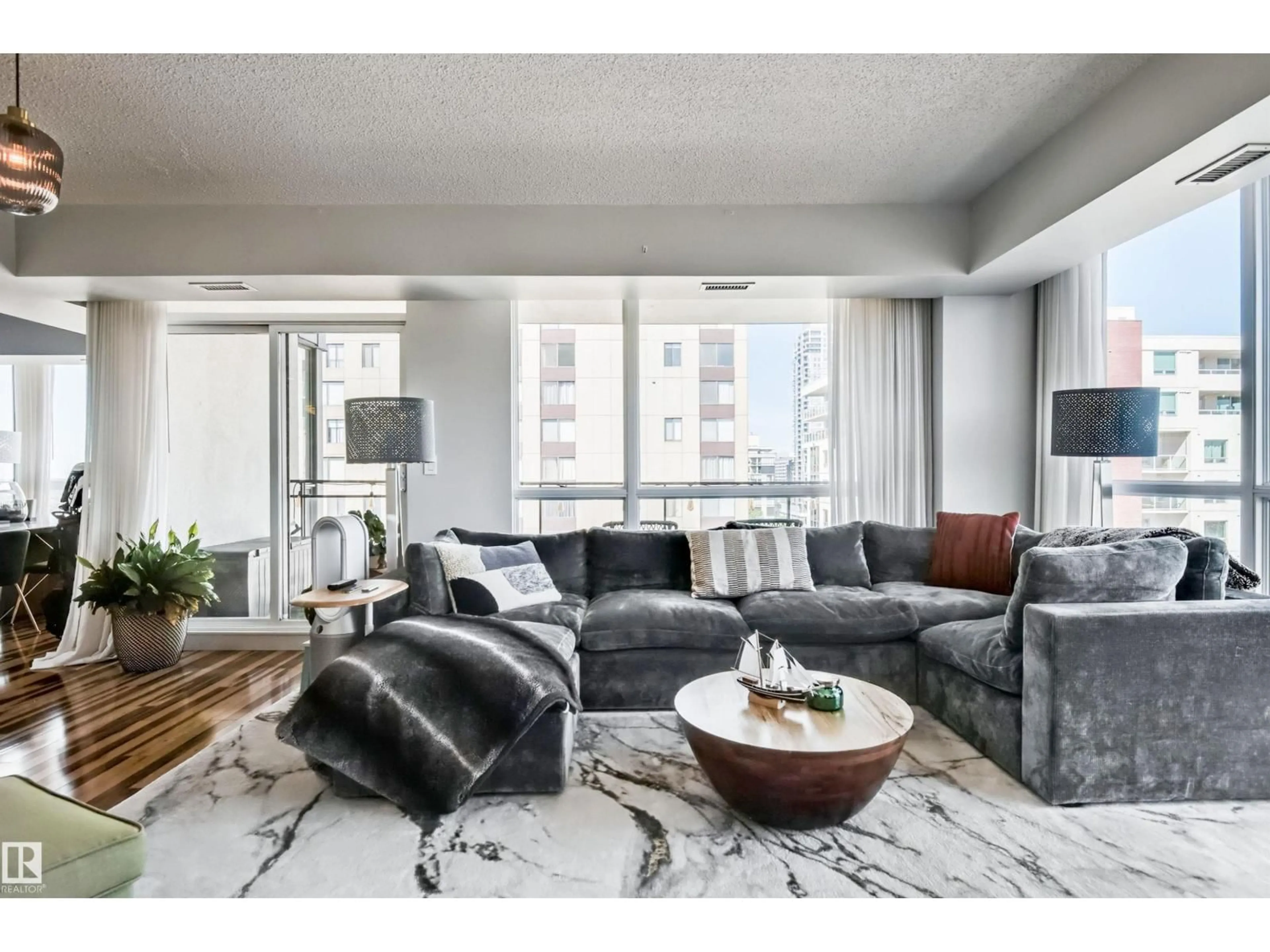 Living room with furniture, unknown for 1003 - 10046 117 ST, Edmonton Alberta T5K1X2