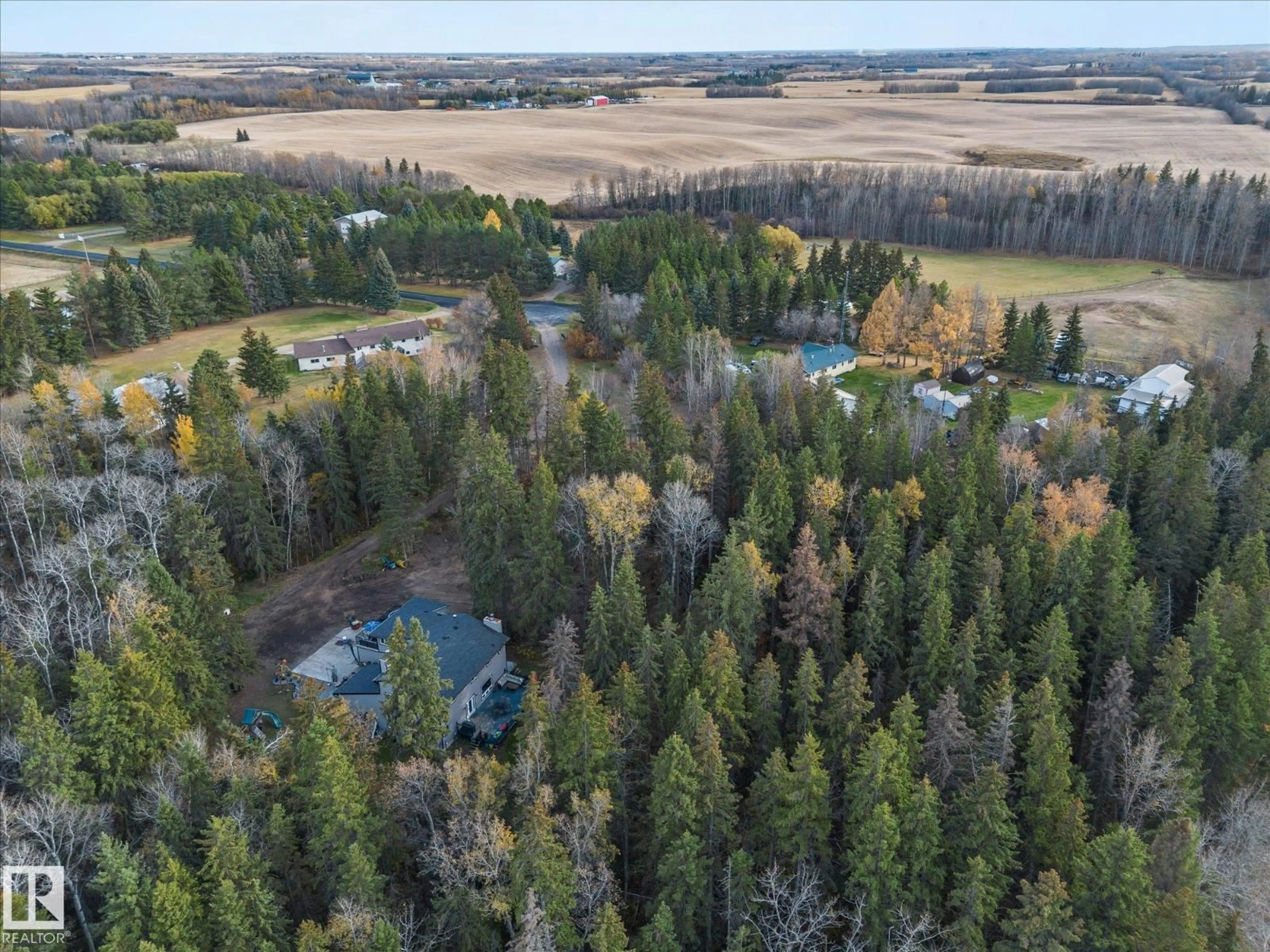 A pic from outside/outdoor area/front of a property/back of a property/a pic from drone, forest/trees view for 22 52420 RGE ROAD 13, Rural Parkland County Alberta T7Y2C1