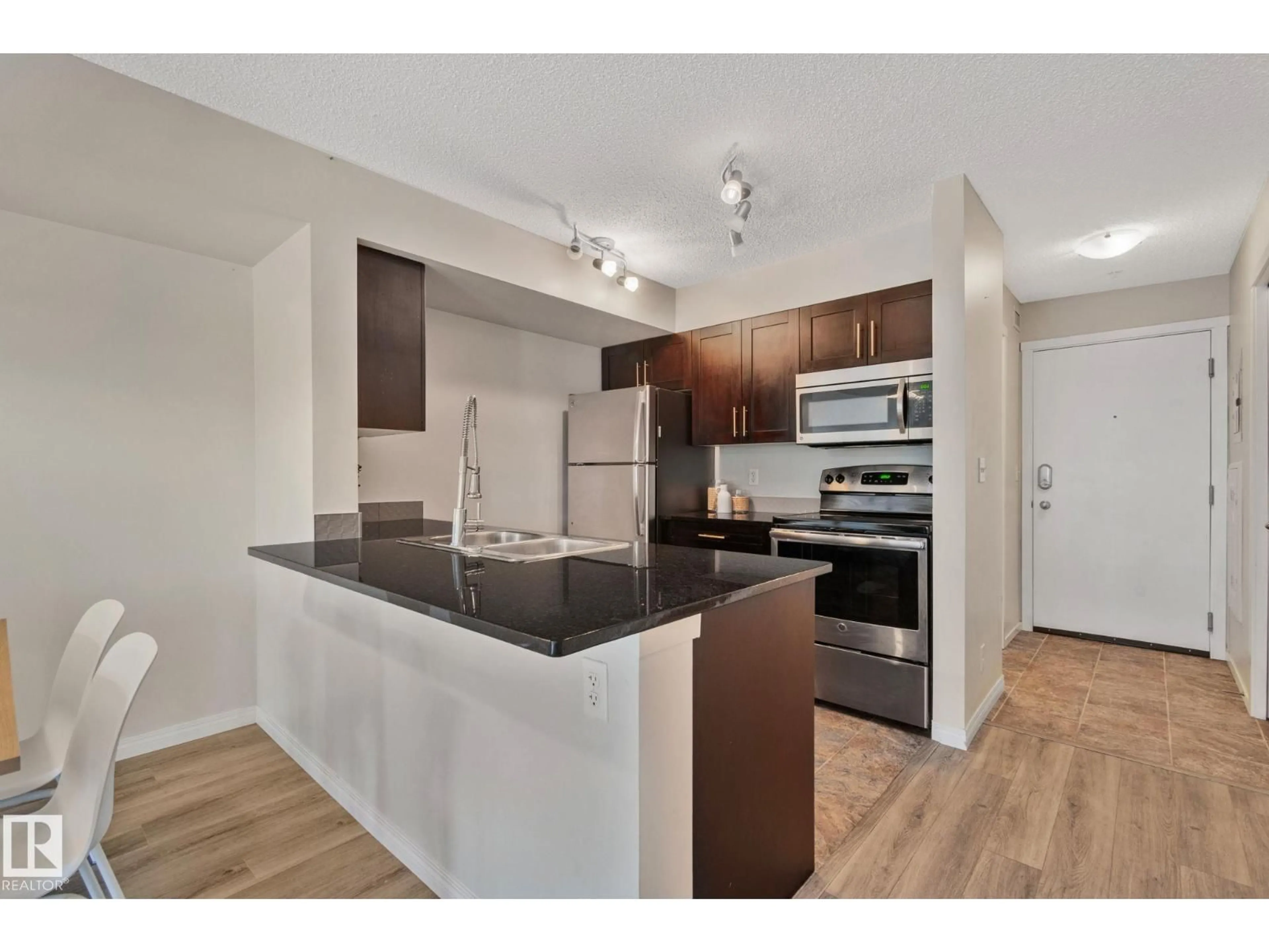 Standard kitchen, wood/laminate floor for 5804 - 210 MULLEN PL, Edmonton Alberta T6R0W3