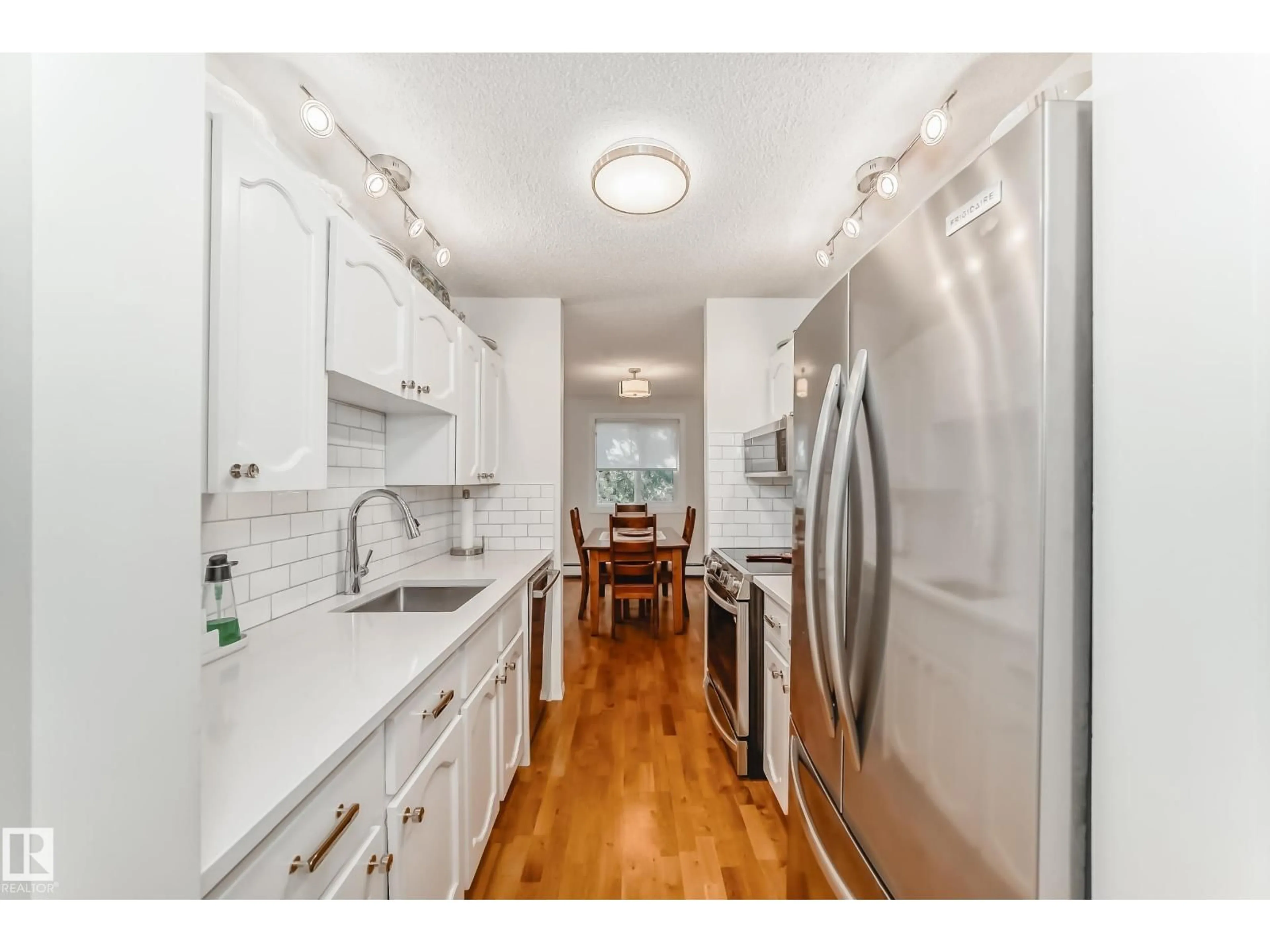 Open concept kitchen, unknown for 201 - 14803 51 AV, Edmonton Alberta T6H5G4