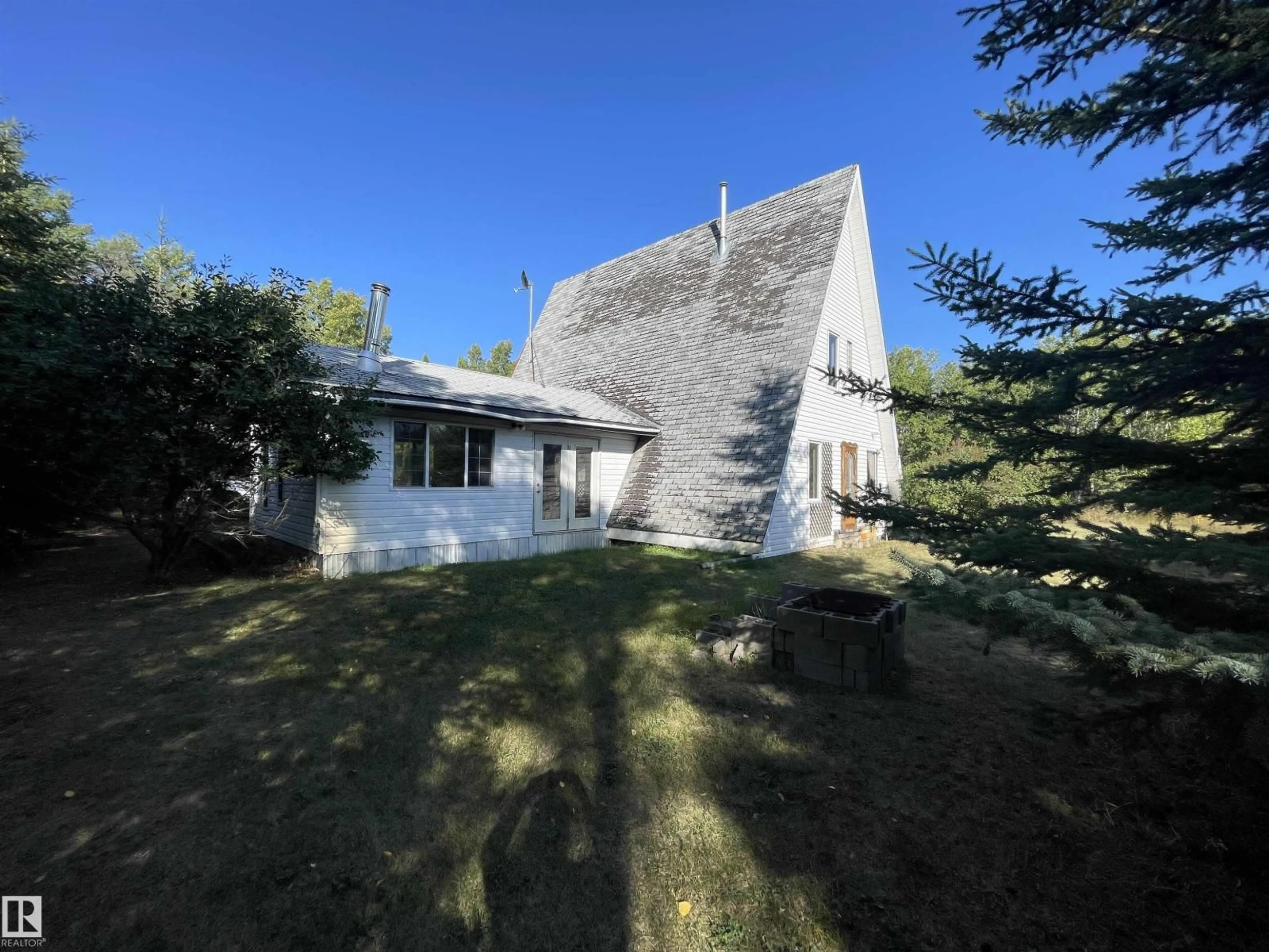 A pic from outside/outdoor area/front of a property/back of a property/a pic from drone, unknown for 61209 - 205 RGE RD 465, Rural Bonnyville M.D. Alberta T9N2H4