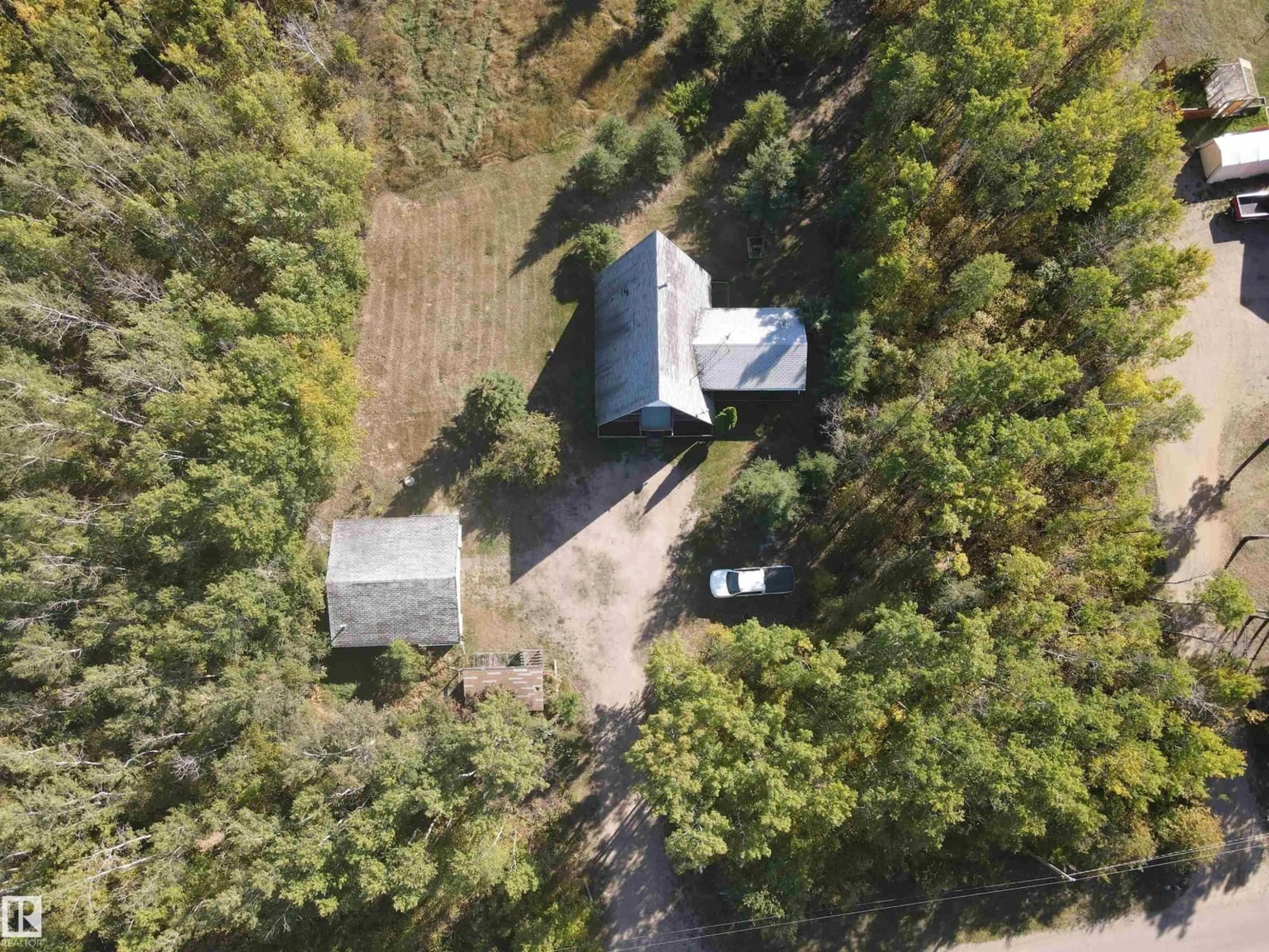 A pic from outside/outdoor area/front of a property/back of a property/a pic from drone, forest/trees view for 61209 - 205 RGE RD 465, Rural Bonnyville M.D. Alberta T9N2H4