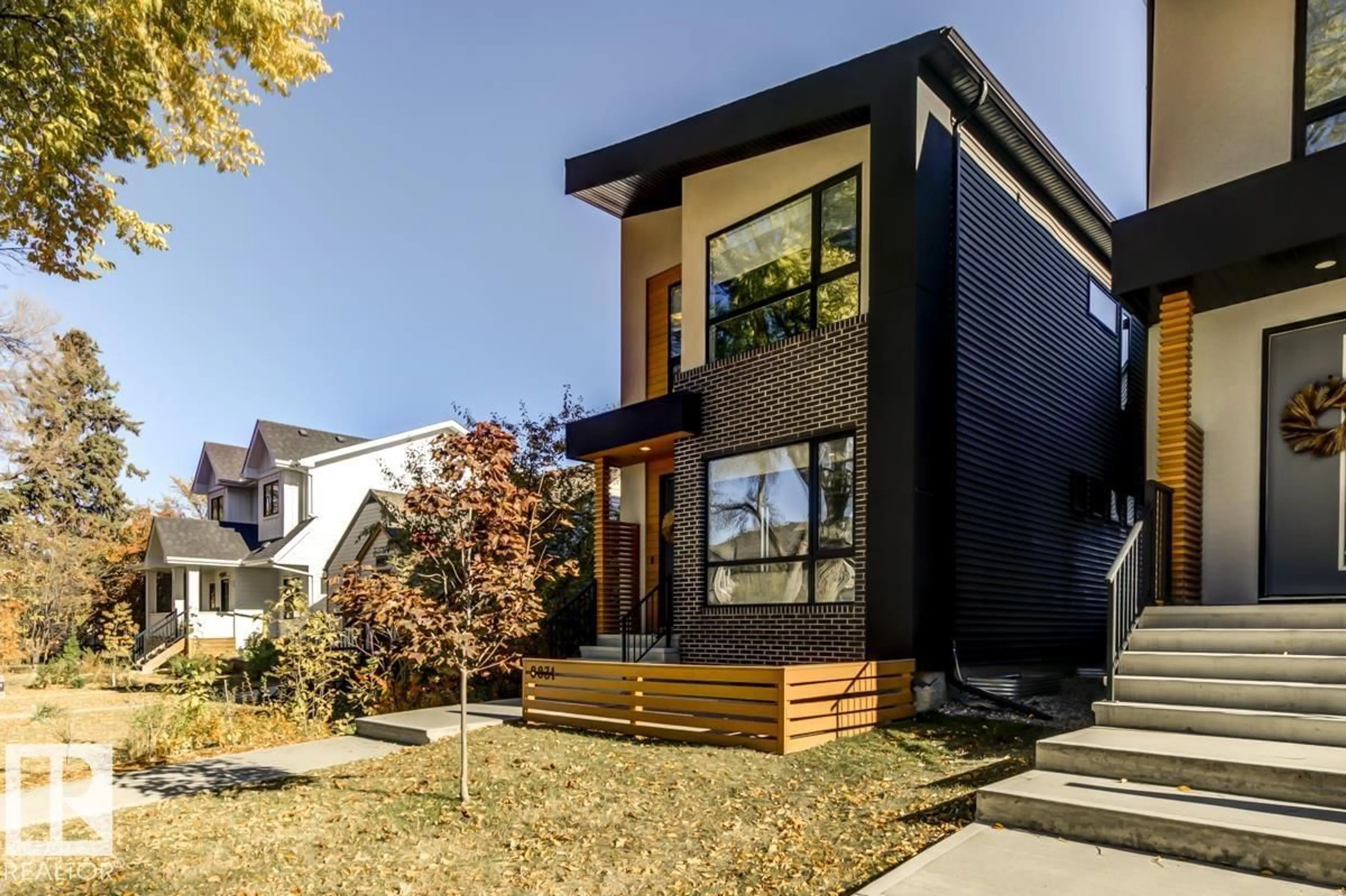 Home with brick exterior material, street for 8831 94 ST, Edmonton Alberta T6C3X2