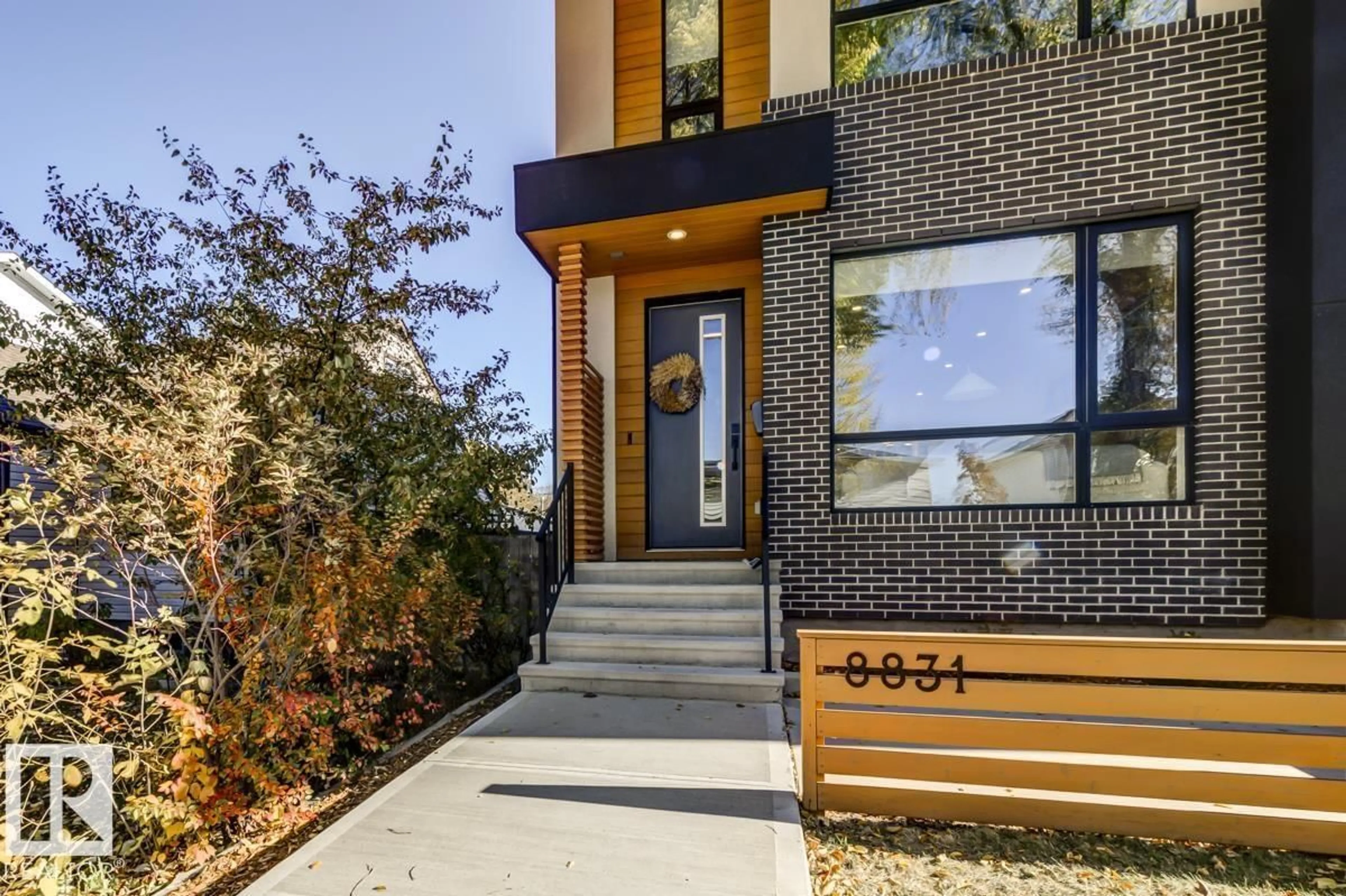 Home with brick exterior material, street for 8831 94 ST, Edmonton Alberta T6C3X2