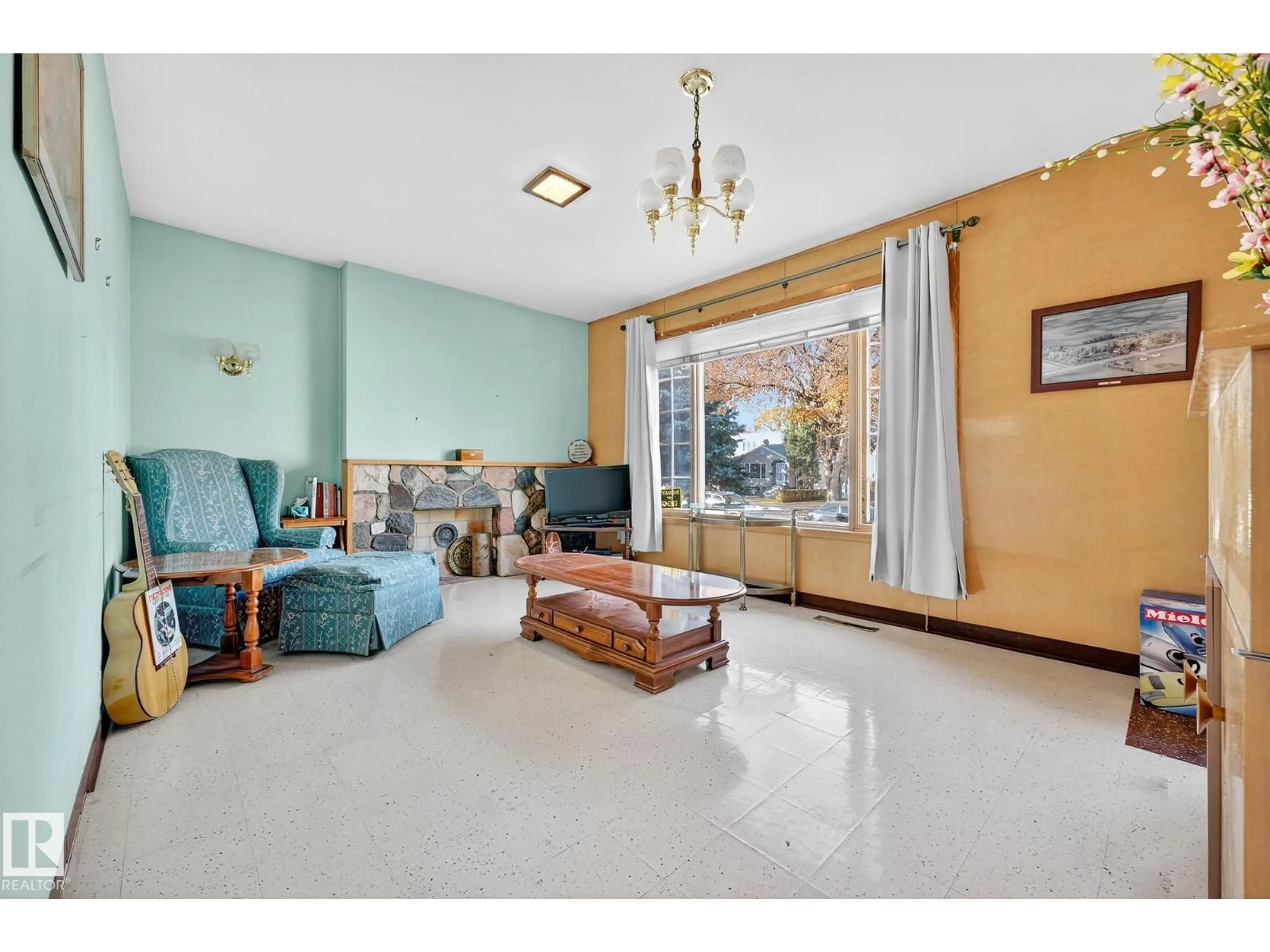 Living room with furniture, unknown for 12119 102 ST, Edmonton Alberta T5G2G8