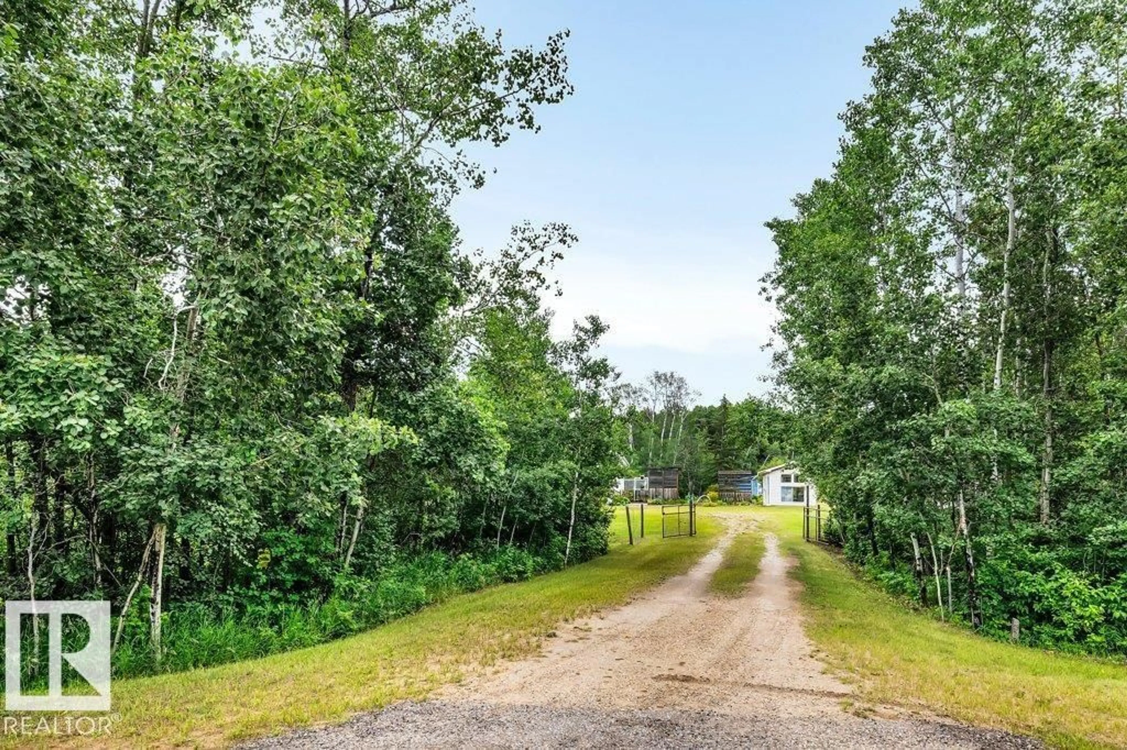 A pic from outside/outdoor area/front of a property/back of a property/a pic from drone, forest/trees view for 24 - 51213 RGE RD 261, Rural Parkland County Alberta T7Y1B1
