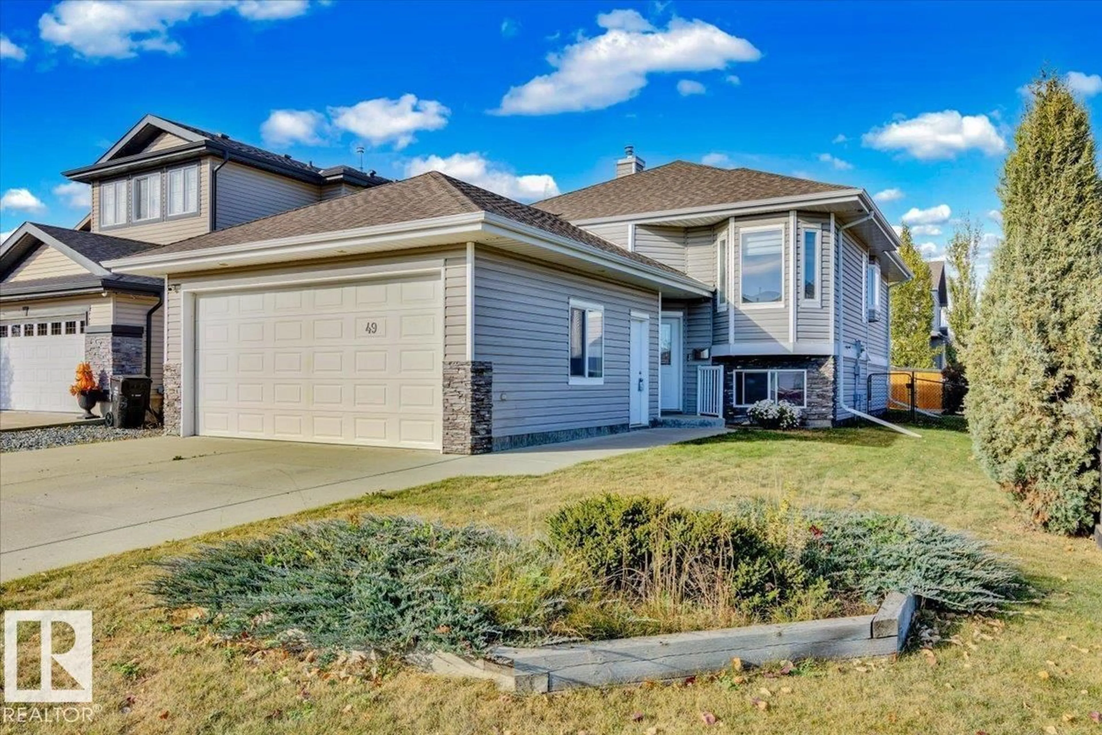 Home with vinyl exterior material, street for 49 BIRCHMONT DR, Leduc Alberta T9E8S4