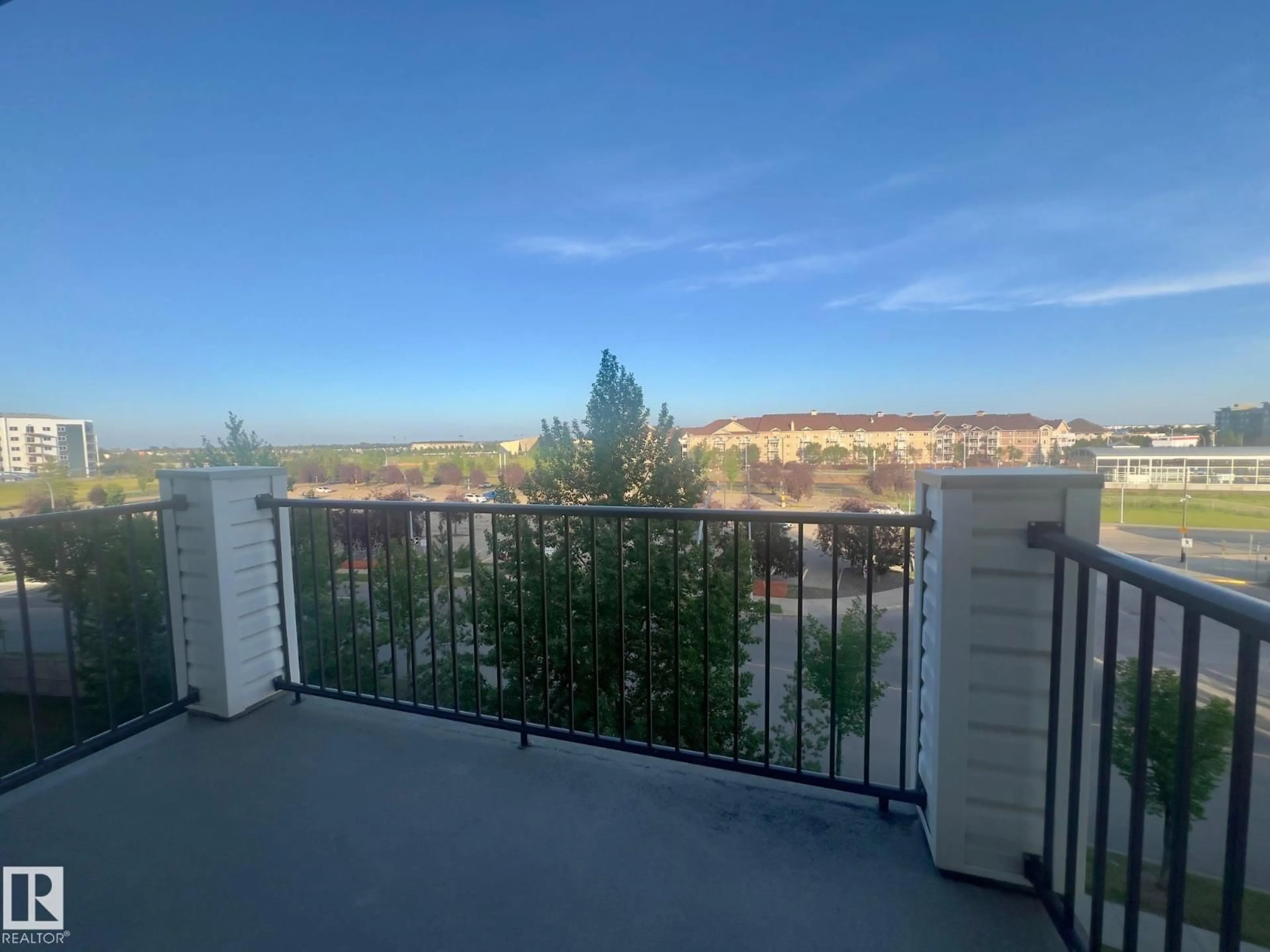 Balcony in the apartment, city buildings view from balcony for # - 1423 CLAREVIEW STATION DR, Edmonton Alberta T5Y0E6