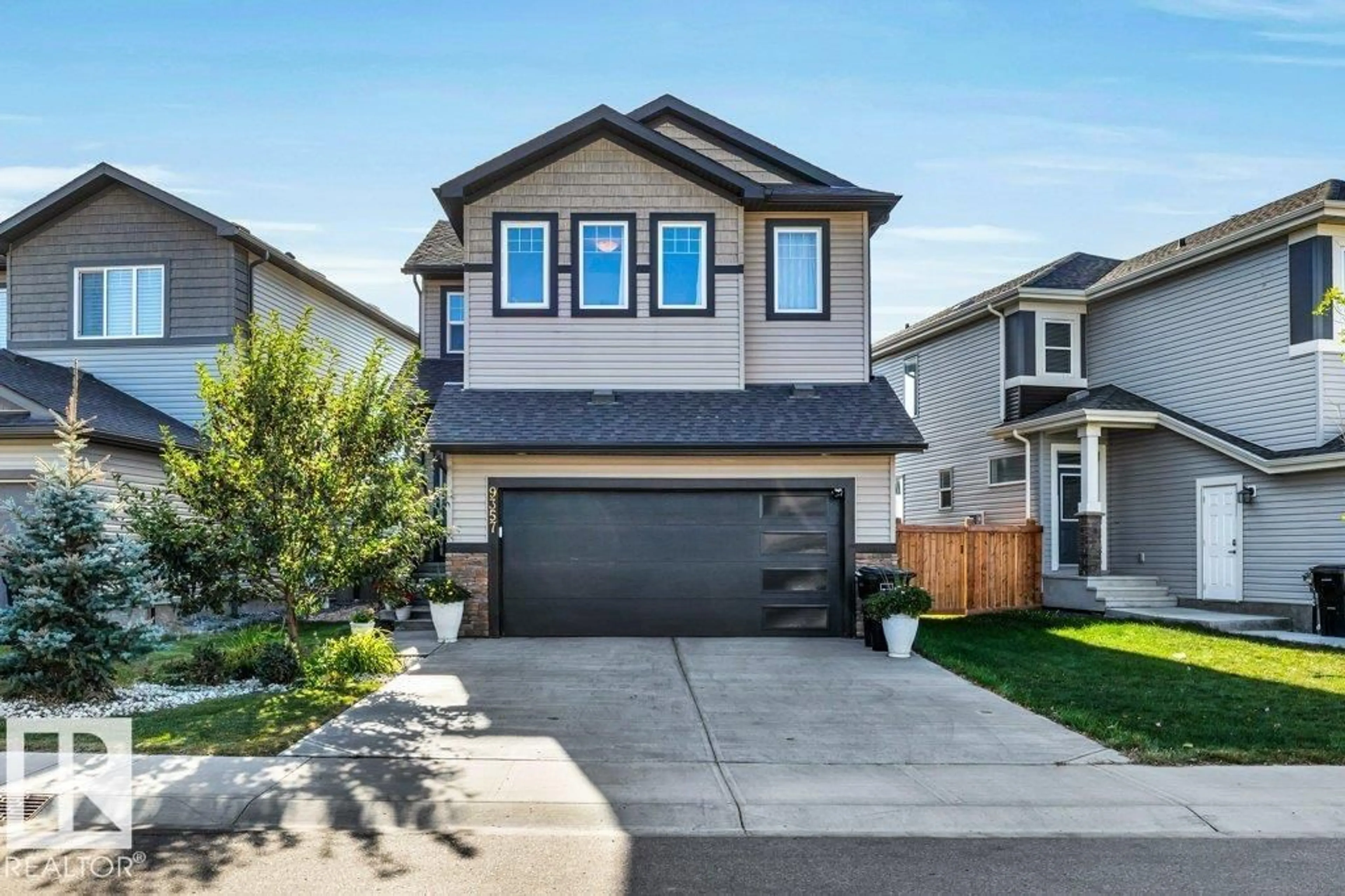 Home with vinyl exterior material, street for 9357 COOPER BEND SW, Edmonton Alberta T6W4A4