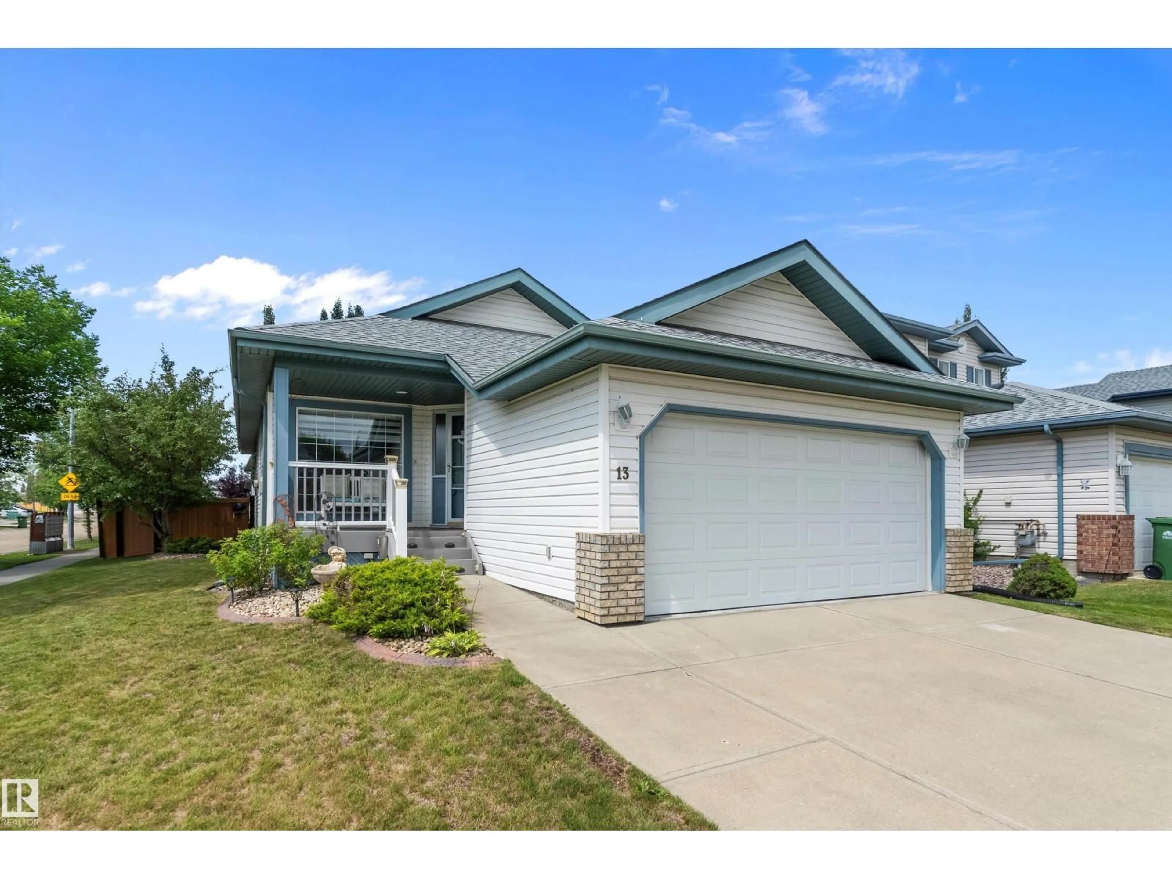 Home with vinyl exterior material, street for 13 NEWMARKET WY, St. Albert Alberta T8N6Y8