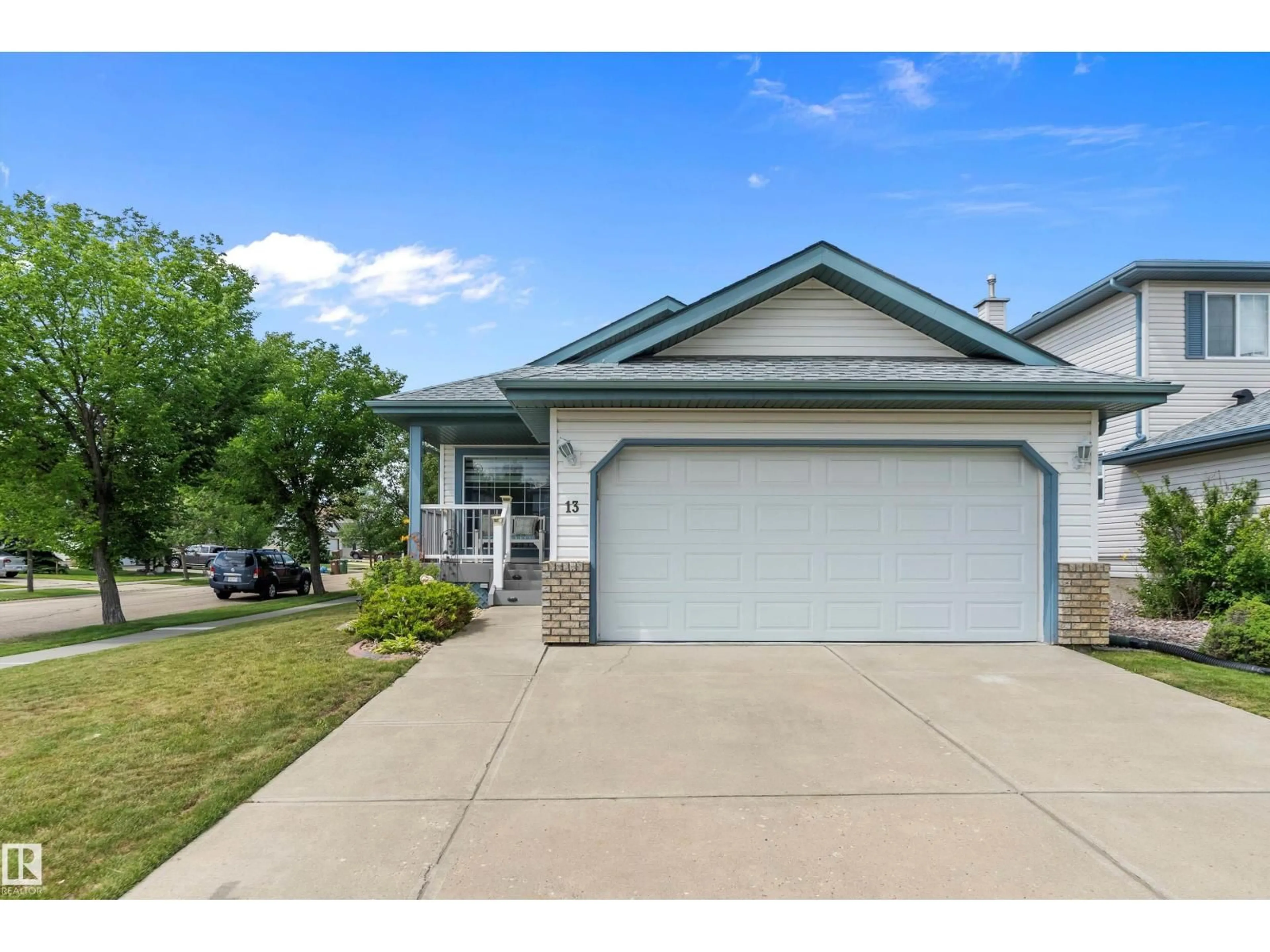 Home with vinyl exterior material, street for 13 NEWMARKET WY, St. Albert Alberta T8N6Y8