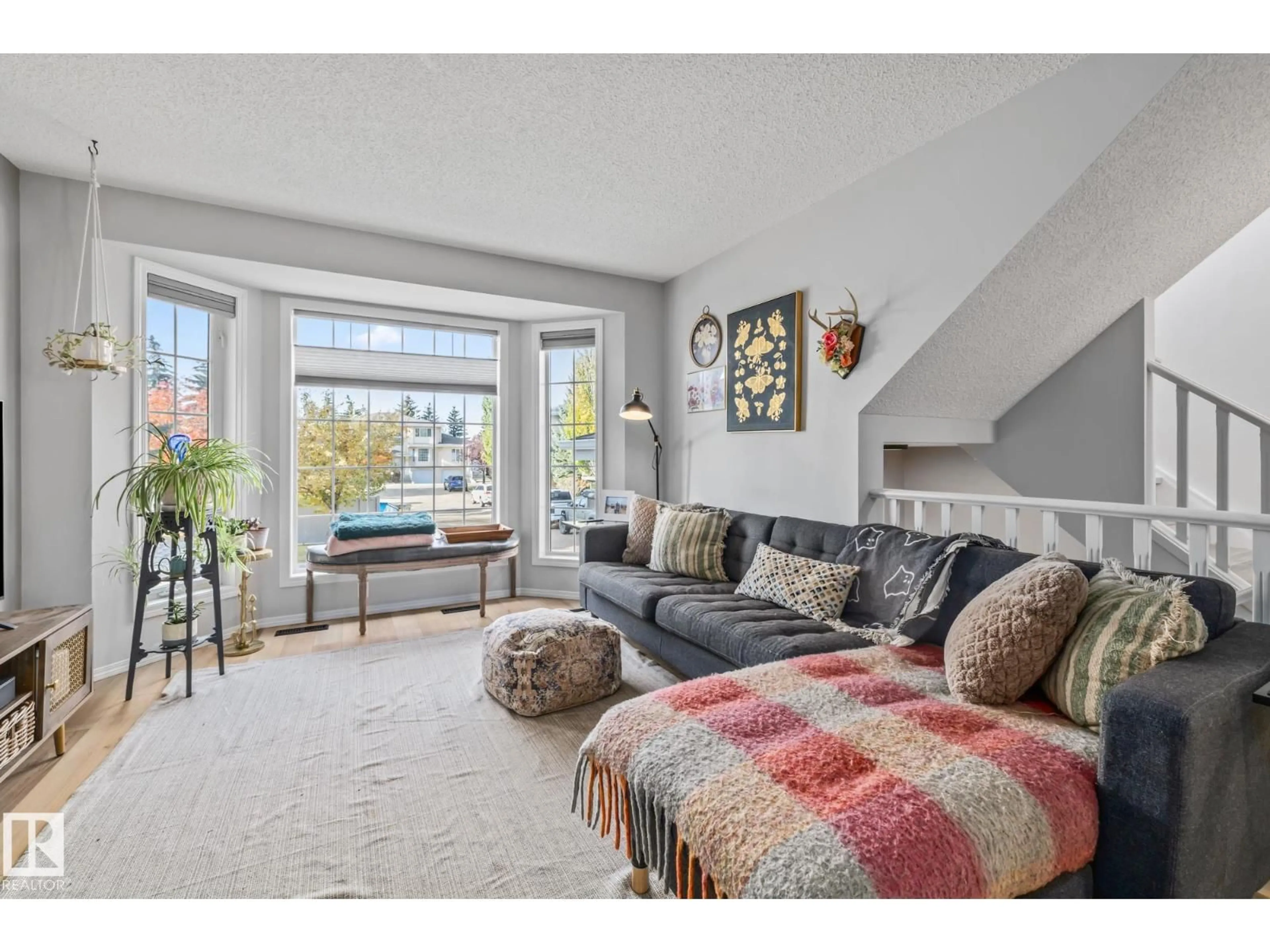 Living room with furniture, carpet floor for 1606 JAMHA RD, Edmonton Alberta T6L6V7
