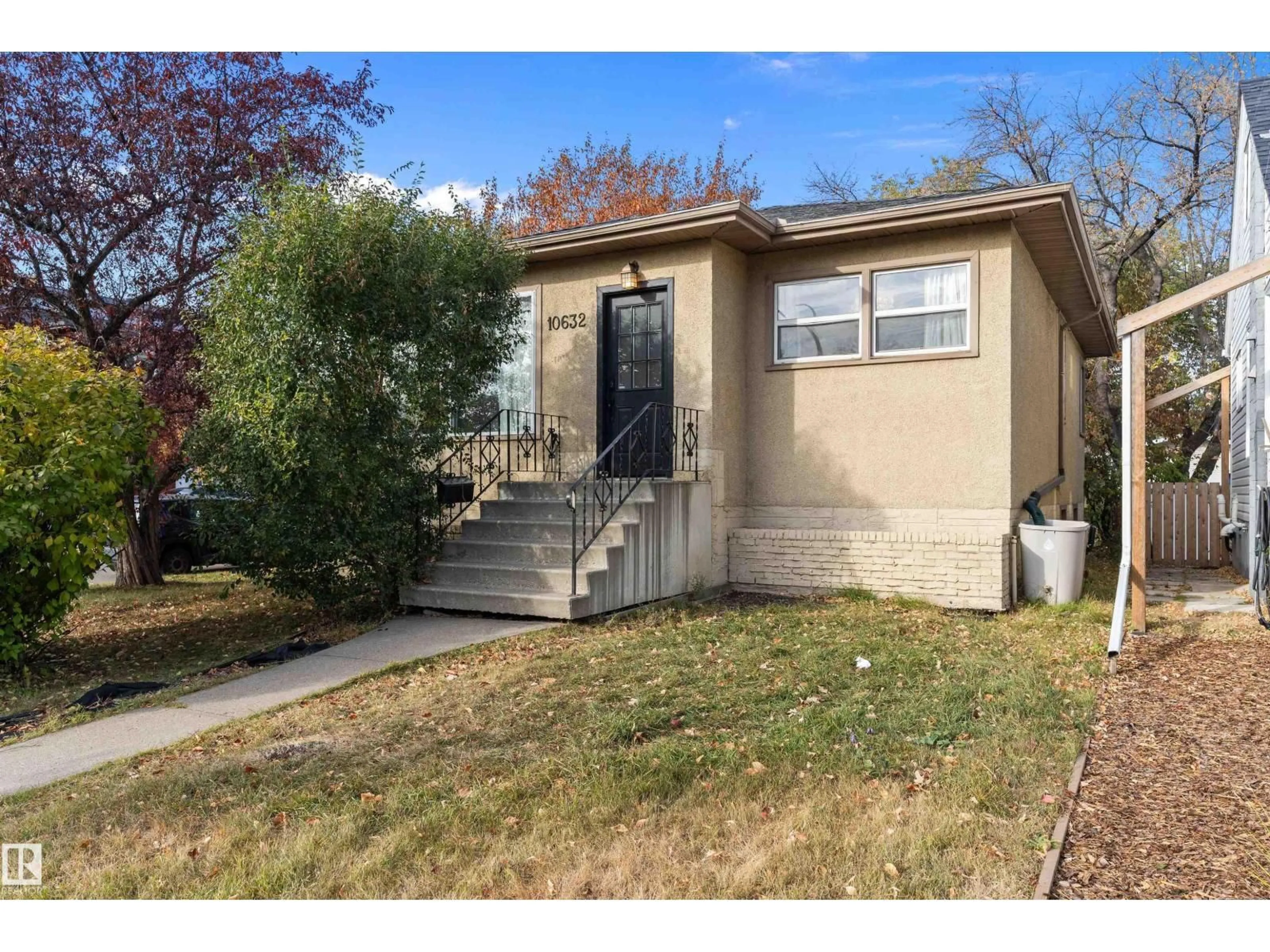 Home with vinyl exterior material, street for 10632 73 AV, Edmonton Alberta T6E1C4