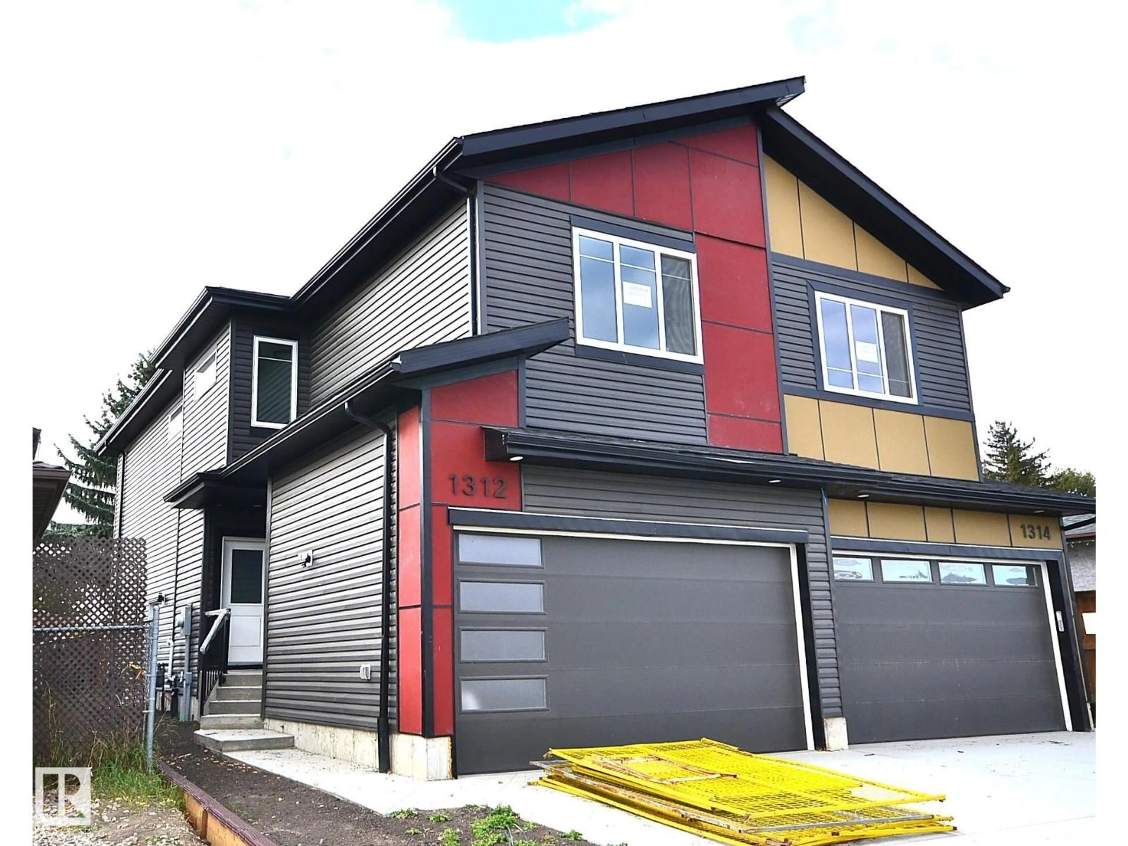 Home with vinyl exterior material, street for NW - 1312 35 ST, Edmonton Alberta T6L3E8