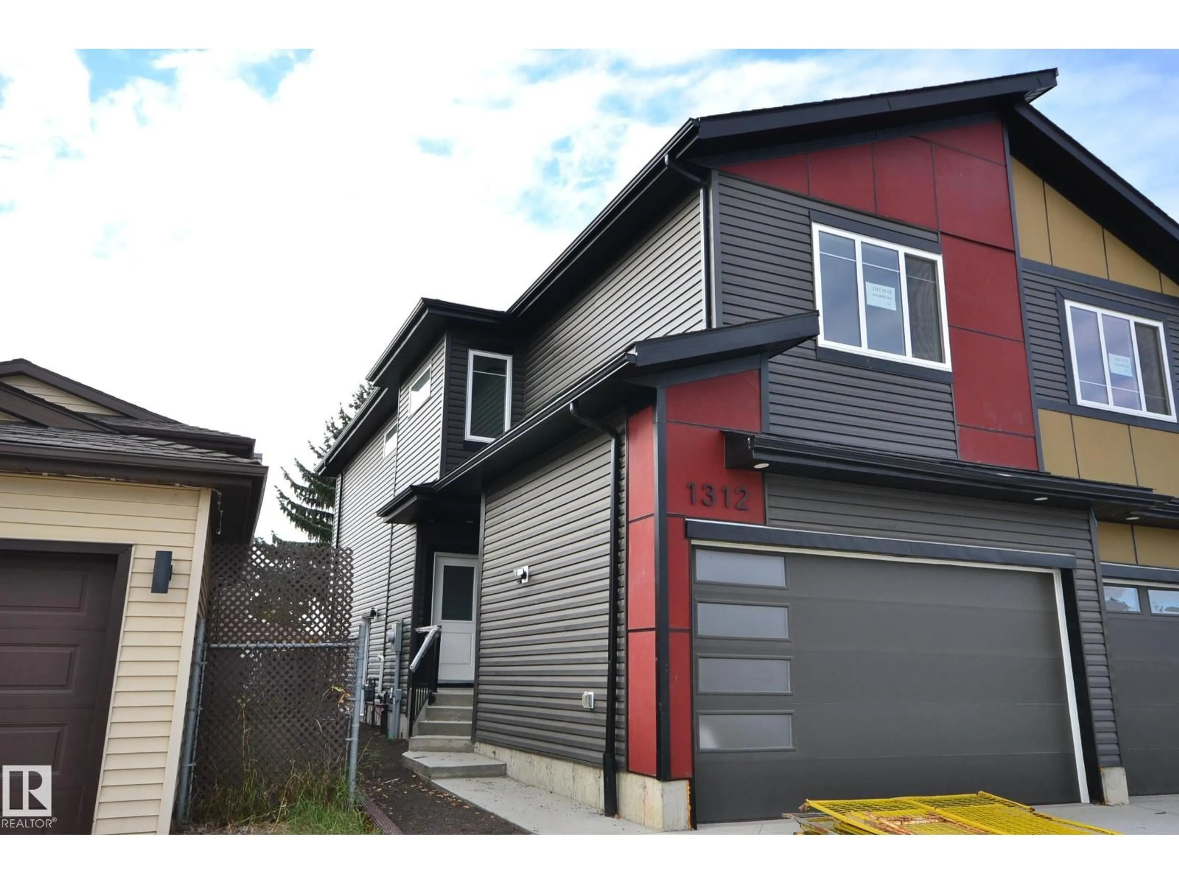 Home with vinyl exterior material, street for NW - 1312 35 ST, Edmonton Alberta T6L3E8