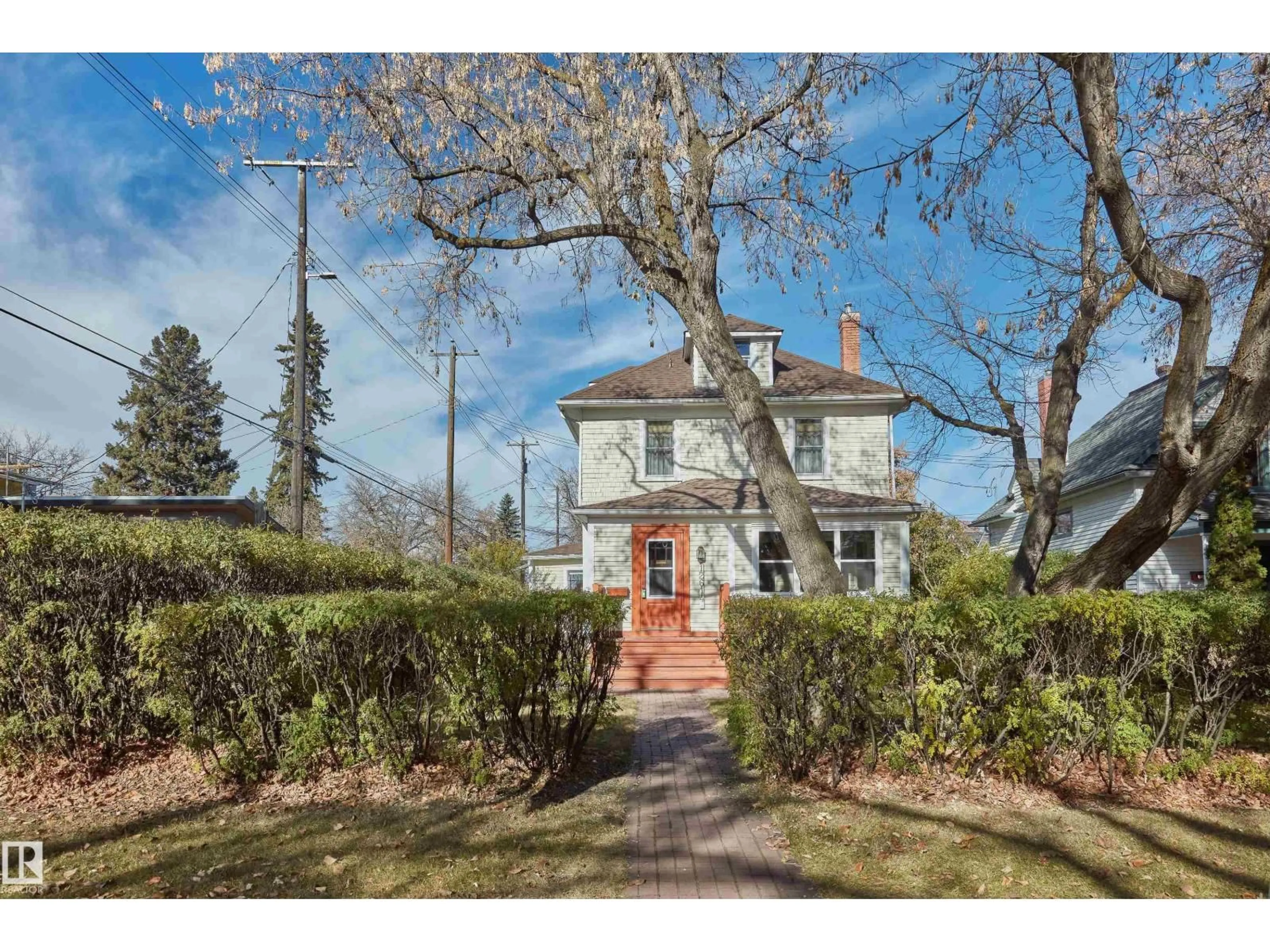 Home with brick exterior material, street for 12614 106 AV, Edmonton Alberta T5N0Z7