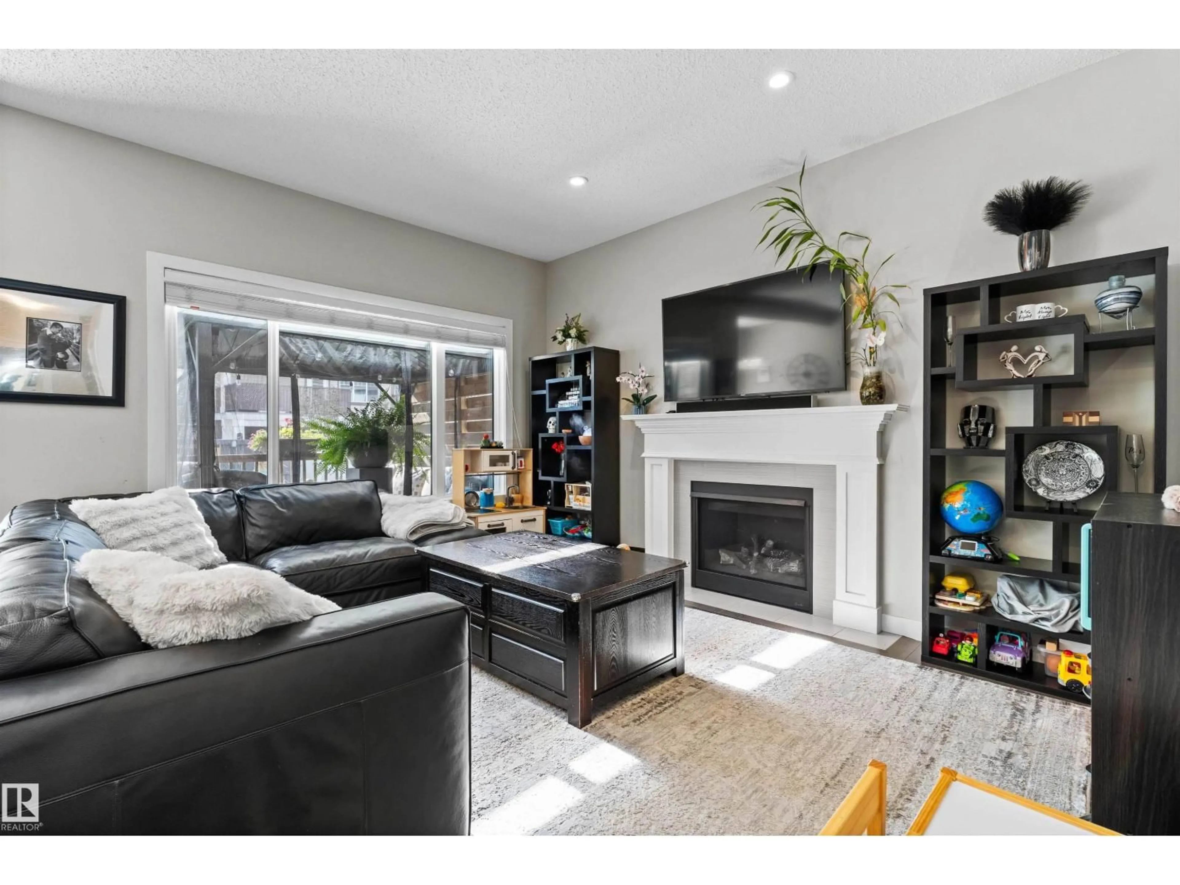 Living room with furniture, unknown for 3815 170 AV, Edmonton Alberta T5Y3S2