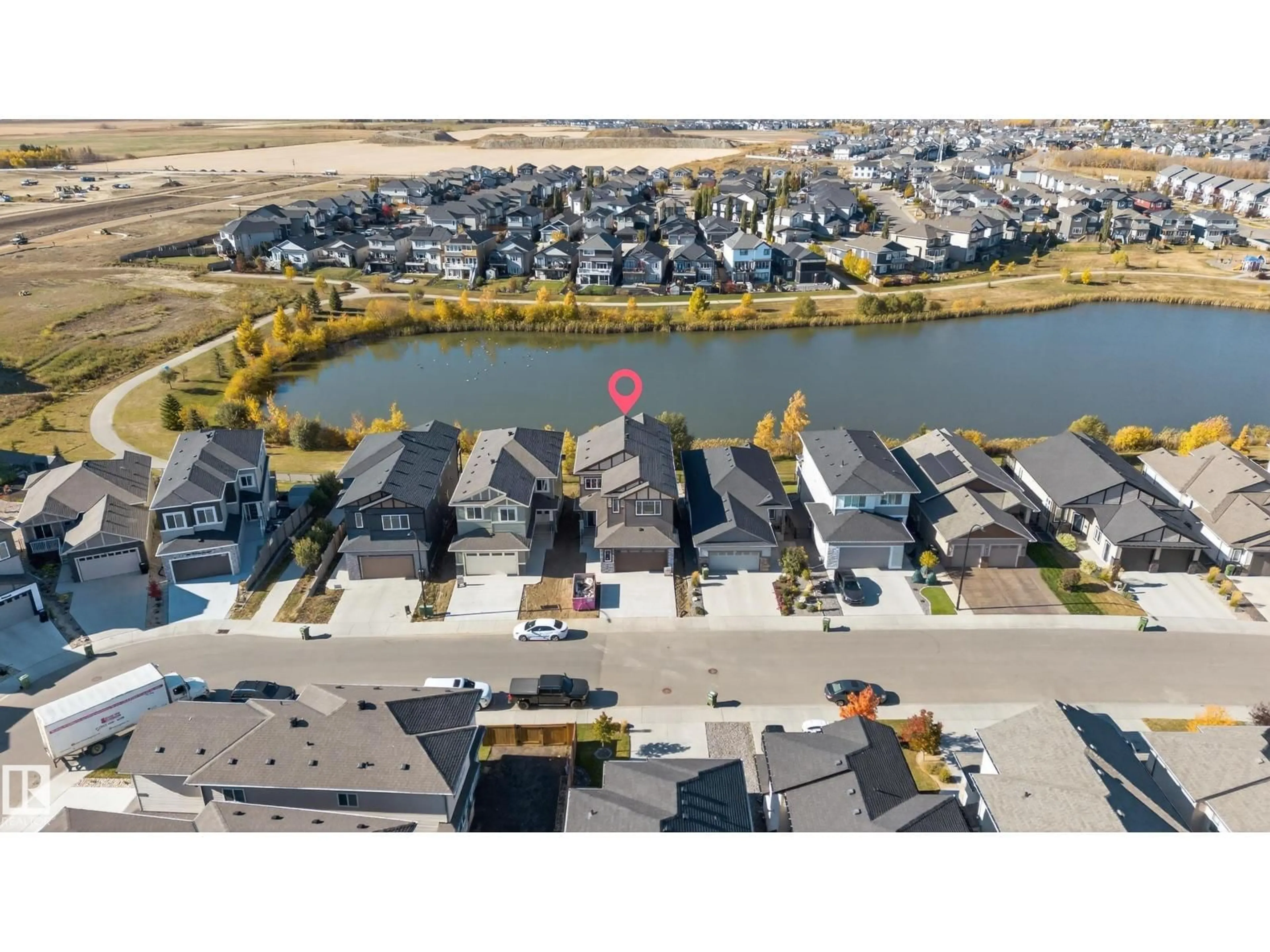A pic from outside/outdoor area/front of a property/back of a property/a pic from drone, water/lake/river/ocean view for 474 ROBERTS CR, Leduc Alberta T9E1N4