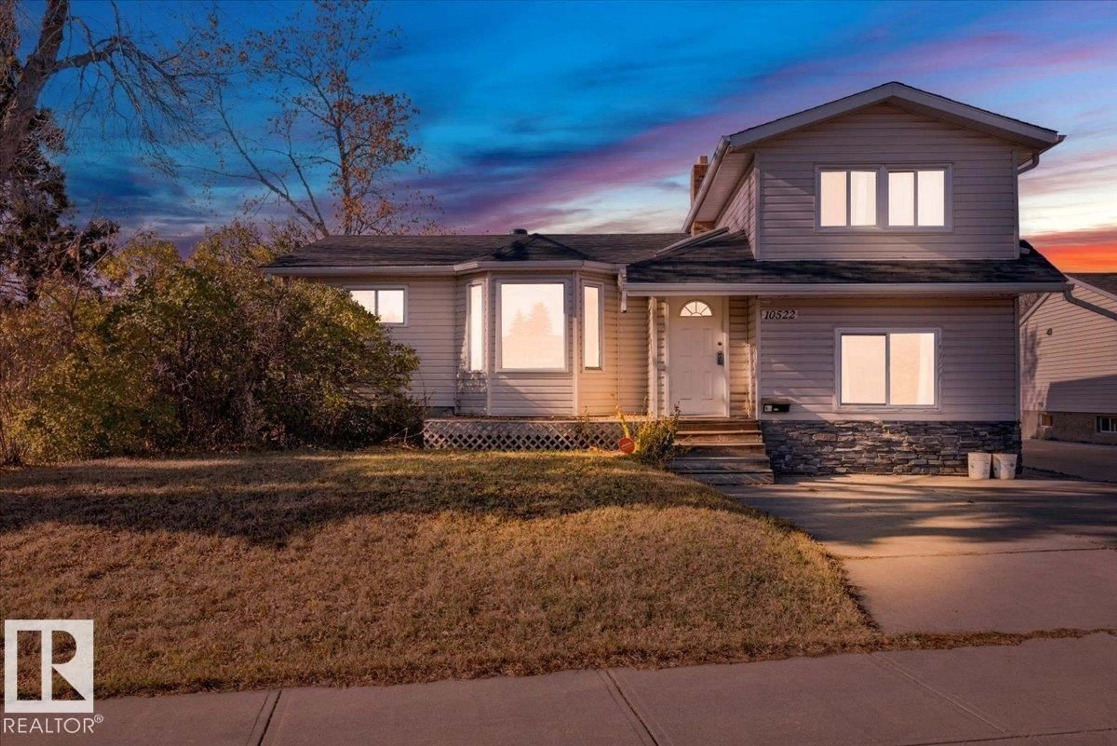 Home with vinyl exterior material, street for NW - 10522 161 ST, Edmonton Alberta T5P3J7