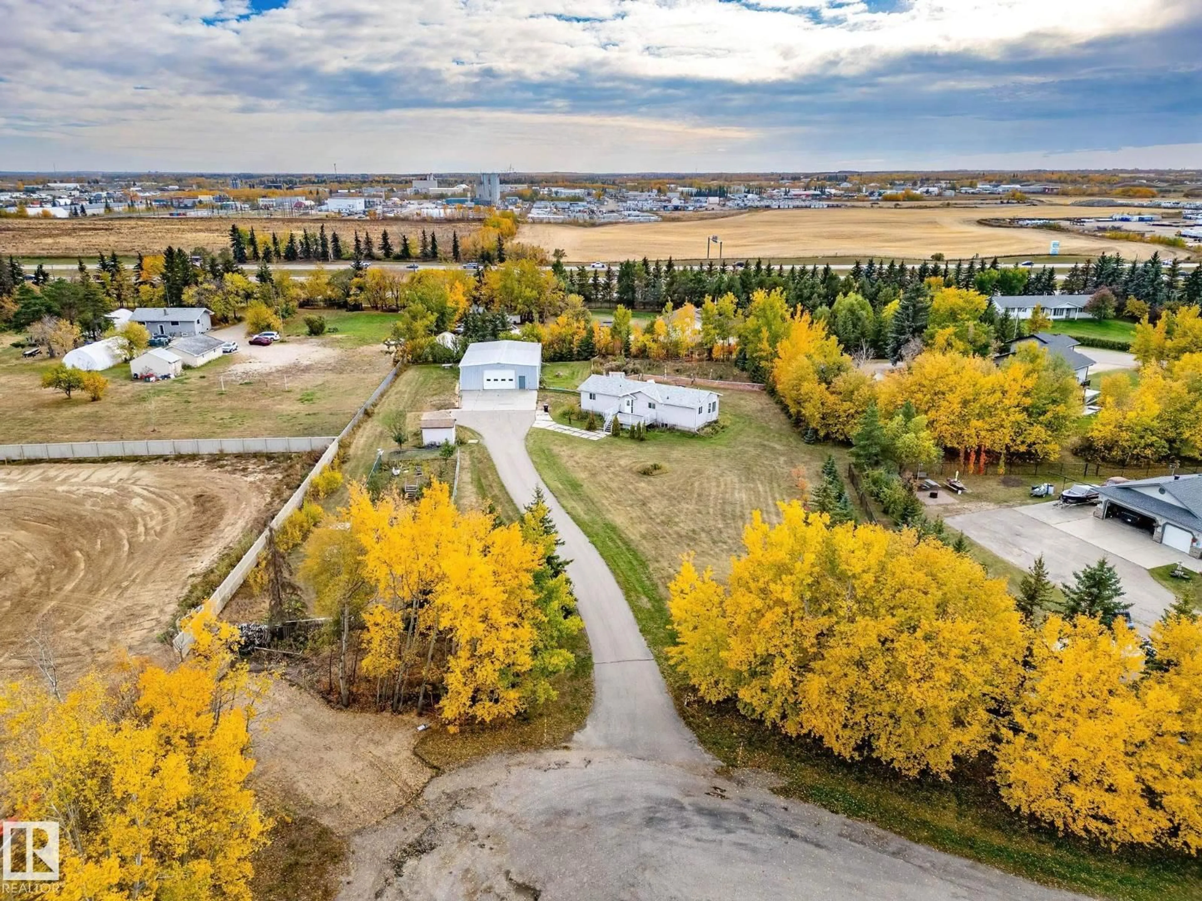A pic from outside/outdoor area/front of a property/back of a property/a pic from drone, water/lake/river/ocean view for 22311 119 AV, Edmonton Alberta T5S0S9