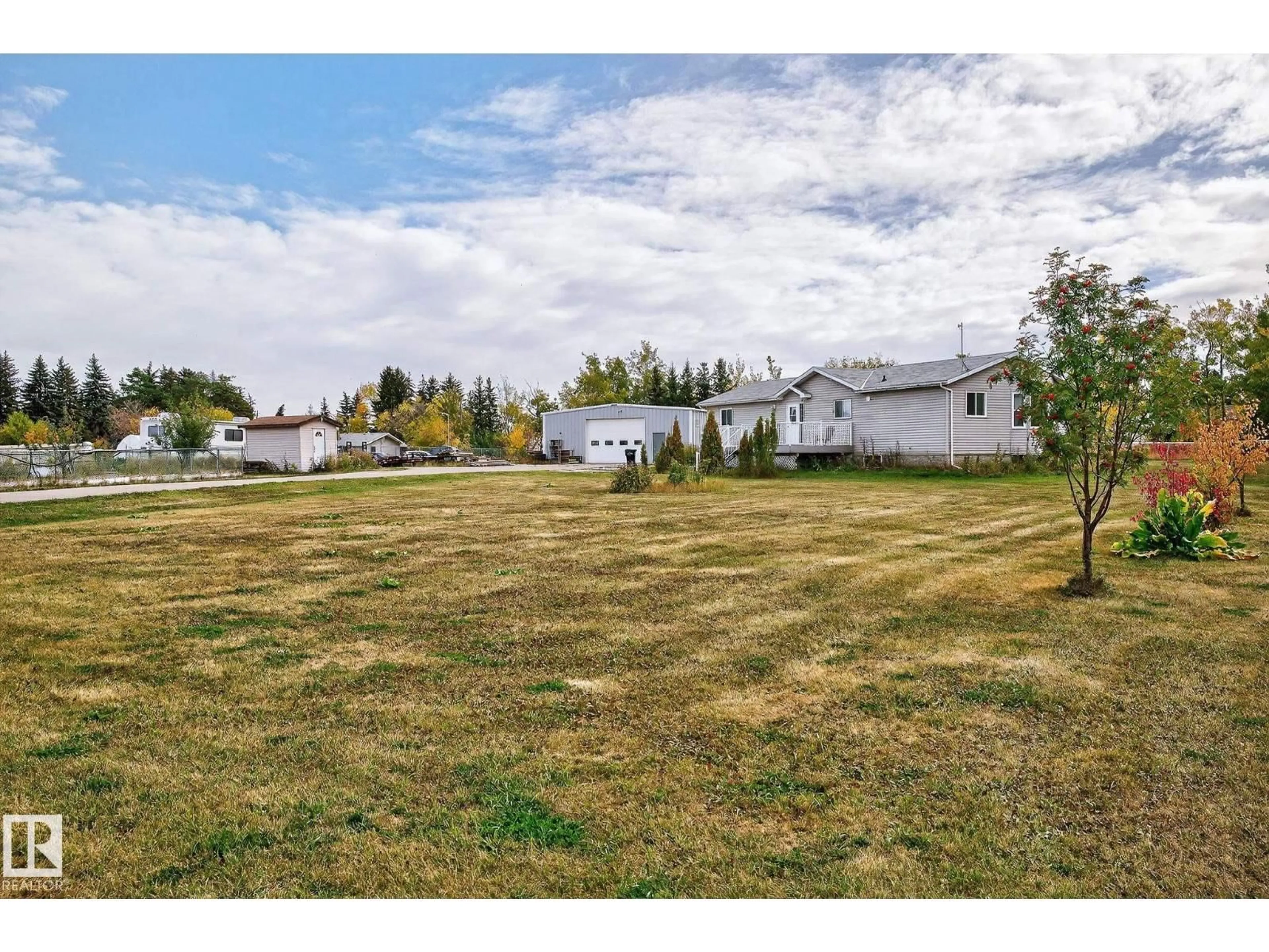 A pic from outside/outdoor area/front of a property/back of a property/a pic from drone, unknown for 22311 119 AV, Edmonton Alberta T5S0S9